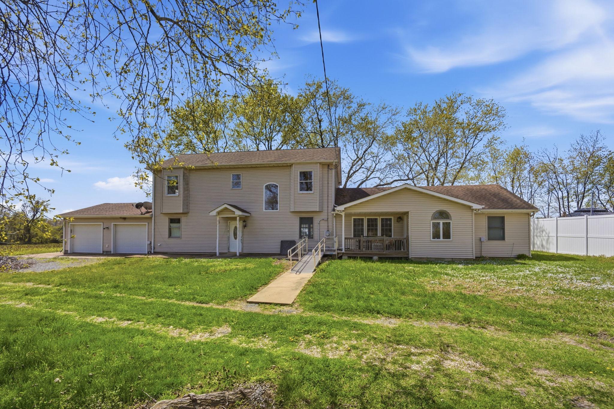 This charming traditional home, originally built in 1957 was renovated around 2000. It offers a blend of classic appeal and modern comfort. Spanning about 3,300 square feet, the spacious layout invites you to create lasting memories. Wood and ceramic tile flooring throughout provide a cozy atmosphere. The expansive outdoor space offers endless possibilities. Currently in ag use, the 25 acres at the rear of the property could remain in ag use as tilled land and/or be used for hunting or as a horse farm. With ample room to customize, this home is a canvas for your personal touch. Located in Kent County, you'll enjoy a peaceful retreat while still being close to local amenities. This property is not just a house; it's a place where you can truly feel at home. Don't miss the opportunity to make this inviting space your own! This property is being sold as-is.