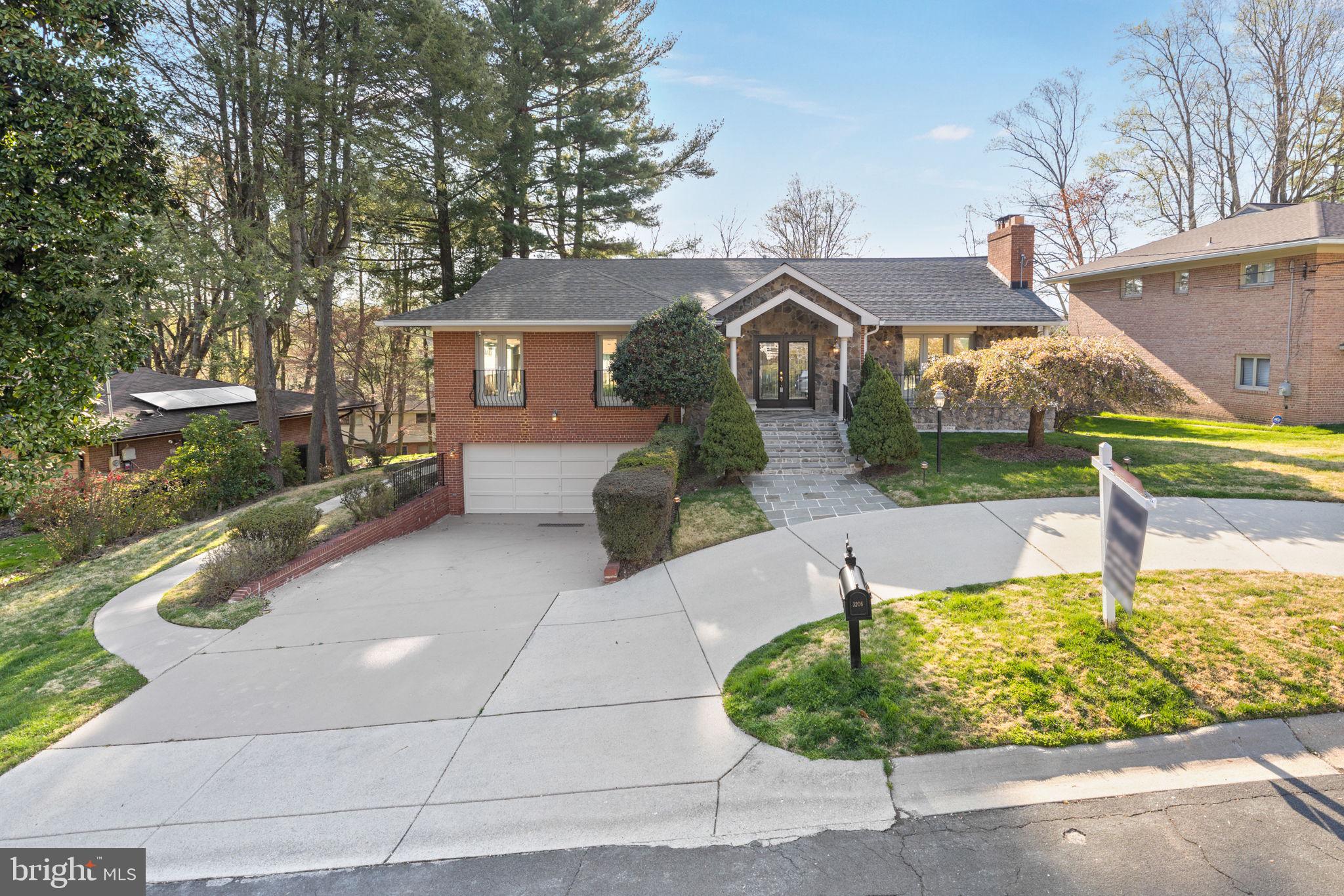 Outstanding opportunity to own this impeccable home in Chevy Chase MD! Nothing left undone, this home boasts attention to every detail--Natural light floods throughout--the 2 story addition created cathedral ceilings and walls of windows with picturesque views. Welcomed by an illuminated circular driveway, a wide flagstone walkway and leaded glass double door entry, it is just the beginning. The main level is perfect for any gathering you would want.. the travertine flooring presents a classic, neutral look to show off your art and furniture perfectly. One of 4 gas fireplaces is in the LR; flowing into the oversized dining room, the proportions are perfect for small to large gatherings! The Kitchen boasts an extra long island, a very hi-tech brand new refrigerator, a beverage fridge, wall oven and 6 burner gas cooktop. Leading into into the breakfast area everyday dining combined with a fabulous family room --the oversized windows & cathedral ceilings here make it feel like treehouse views! The Primary BR is a luxurious room.. the oversized bedroom has a gas FP, a sitting area with cathedral ceiling & a perfect Juliette balcony to enjoy each day. A room-sized walk-in closet and spa like bath complete this primary suite. Two additional bedrooms, each with their own full baths complete the main level.. all of these bedrooms have hardwood flooring. The walkout Lower Level boasts lots of natural light, a huge rec room w/gas FP, and a den area that leads out to the level backyard. There is an exercise room which leads out to a covered patio; and a  full bath. The perfect in-law ensuite bedroom has a gas FP AND a sitting room with windows overlooking the yard. And a 2nd laundry room in the lower level. An oversized 2 car garage has its own storage room.  The flat backyard provides just the right place for play or even a pool!