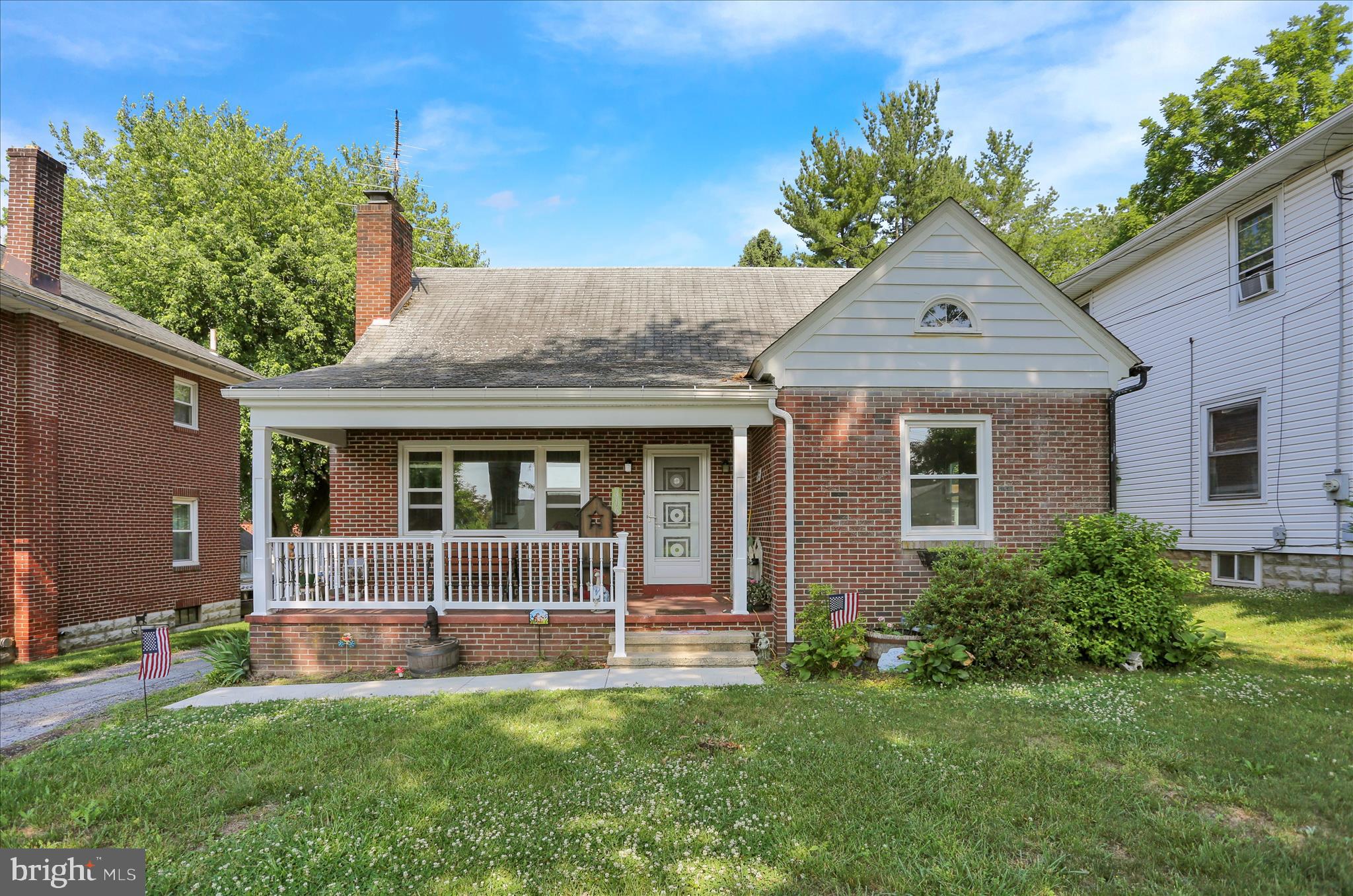 **Offers received, deadline Sunday 5pm** Charming brick Cape Cod offering flexible living space and classic character. The warm and inviting living room features a wood burning fireplace, creating a cozy focal point as you enter the home. The first floor includes two comfortable bedrooms and an updated full bathroom with a walk‑in shower, along with a bright kitchen and dining area overlooking the backyard.

The second floor offers a large open bedroom with great versatility for a primary suite, guest space, or home office. An unfinished walkout basement provides excellent storage and future finishing potential.

Exterior highlights include newer windows, refreshed porch railings and gutter, a one car detached garage, and an additional carport for extra covered parking.

A solid home with charm, convenience, and room to grow.