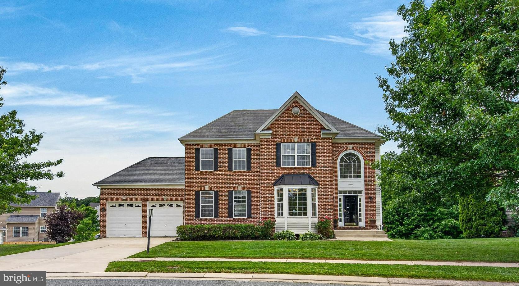 Absolutely Gorgeous! This exceptional 6-bedroom colonial with over 4000 finished sq ft of living area offers a spacious, open floor plan and beautiful recently renovated 3.5 baths, combining luxury, comfort, and modern convenience throughout. Step into the dramatic two-story foyer and enjoy hardwood flooring across the entire main level. The home features a large living room, elegant formal dining room with a bay window, and an inviting family room complete with a gas fireplace and custom blinds. The stunning gourmet kitchen is designed for both everyday living and entertaining, showcasing a center island, granite countertops, 42-inch cabinetry, stainless steel appliances, and a convection oven/microwave. A convenient butler’s pantry leads to a separate laundry room with new washer and dryer, built-in shelving, and direct garage access. The luxurious primary suite is a true retreat, featuring a spa-inspired bath with a freestanding soaking tub, oversized walk-in shower with dual shower heads, steam-free mirror, temperature-controlled bidet, and Bluetooth-enabled lighting and speaker ventilation. The fully finished walkout lower level expands the living space with a large recreation room featuring built-in speakers and recessed lighting, two additional bedrooms, a full bath, and a utility room equipped with a 75-gallon water heater and dual sump pumps, including a Liberty backup system. Additional highlights include recent carpeting and a zoned HVAC system (gas heat and heat pump), approximately 2 years old. Built-in storage and Tesla charging station in garage. Premium landscaped lot offers a private setting backing to forest conservation area. Convenient to Perry Hall, Nottingham, and major commuter routes including I-95 and Route 43 *** A truly outstanding home offering luxury, space, and privacy in a beautiful natural setting! ***