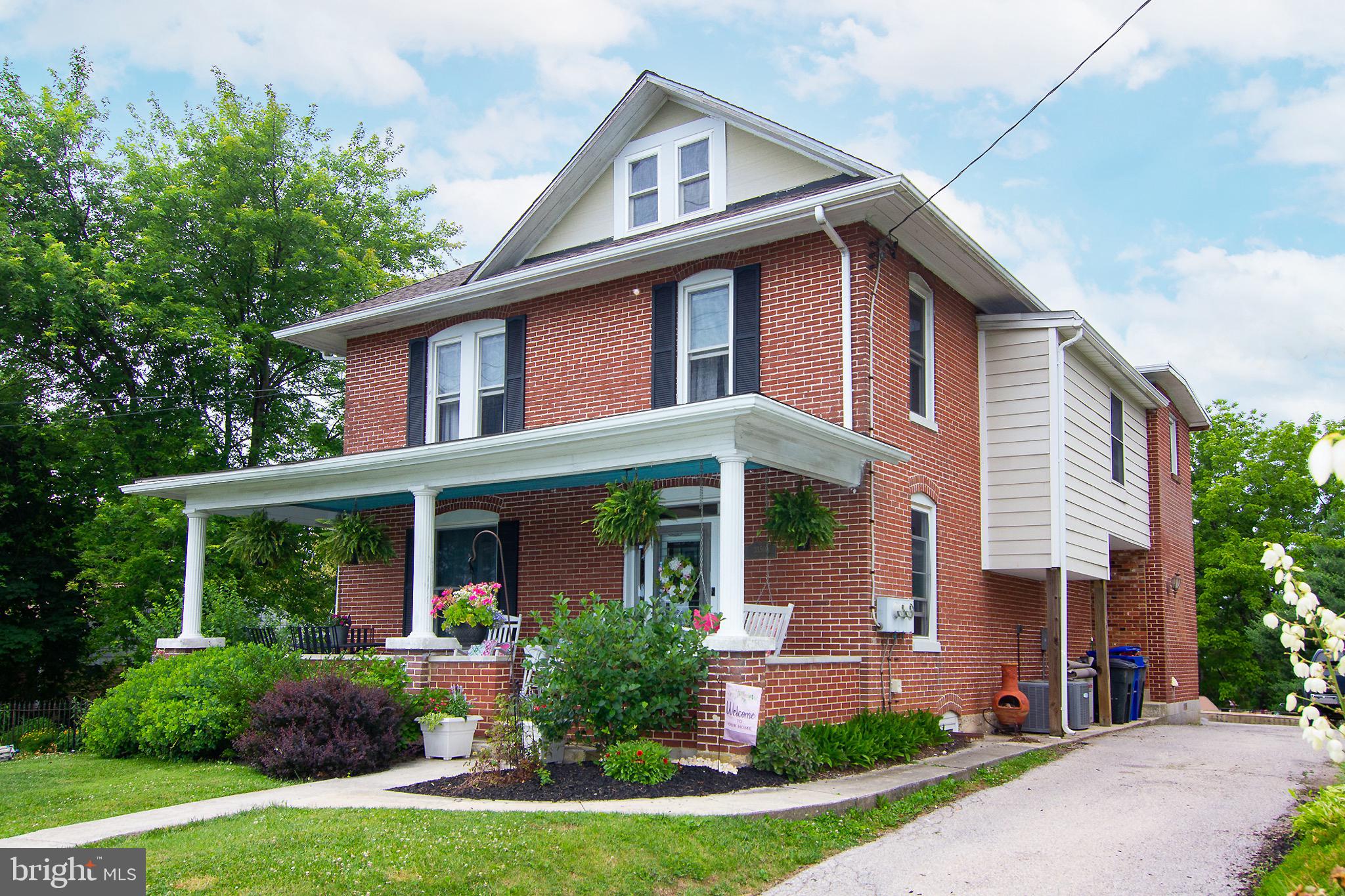 Timeless elegance, meets modern comfort in this stunning  4-corner brick two story Colonial.  Perfectly situated on a charming in-town street directly across from  Christmas Tree park.  This character-filled home showcases beautiful original woodwork, detailed moldings, an abundance of natural light, and thoughtful updates throughout.
From the warmth of the covered front porch to the the gracious foyer and an easy flow into the spacious living room with wood floors . Updated kitchen with granite countertops, an island with a prep sink, abundant cabinetry offering plenty of storage, custom built-ins and SS appliances embraces the center of this home. Large Dining room (with gorgous pocket doors)and access to the screened porch which then continues to the outside living space with patio, garden studio, perfect for home office, fitness or private space as well as a fire-pit and more charm all around.
Upstairs, four spacious bedrooms and two full baths providing ample accommodations, including a serene primary suite with direct access to a private second-floor balcony, private full bath with heated  floors, double sink, shower and soaking tub that enhances the home's comfort and appeal. 
Plus,  enjoy the most charming attic, highlighted by picturesque windows,  distinctive angled ceilings, and more storage cubbis presents endless possibilities for a home office, studio, playroom, or additional flex space. All levels of this colonial is being used to its best ideas including the lower level rec room with powder room and outside access to side yard and sidewalk!
 Blending classic Colonial architecture and exceptional indoor-outdoor living, this remarkable residence offers functionality, and enduring appeal!
A rare opportunity to own a distinctive, character-rich home in an unbeatable location!