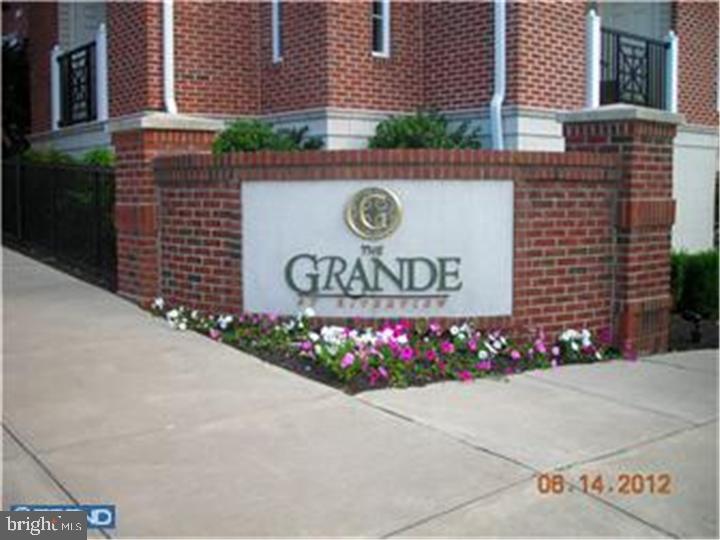 FINE LIVING AT THE GRAND ! Secured one car garage parking , Outdoor swimming pool,Exercise room and Public court yard great for entertaining. This One bedroom unit is ready to move into. Custom paint through out,chair rail moldings in LR/GR & also bathroom. Large Kitchen with granite counter tops, 42" cabinets,Tiled Back Splash and plenty of room to work. Great view of the well landscaped Courtyard from master bedroom that features crown moldings and a walk in closet. This unit has everything you need wall to wall carpets and is pre-wired for cable and phone. The Grand at the Riverview is conveniently located with in walking distance to shopping , restaurants, the bike trail and public transportation. Also minutes away from Rt. 76 and 476