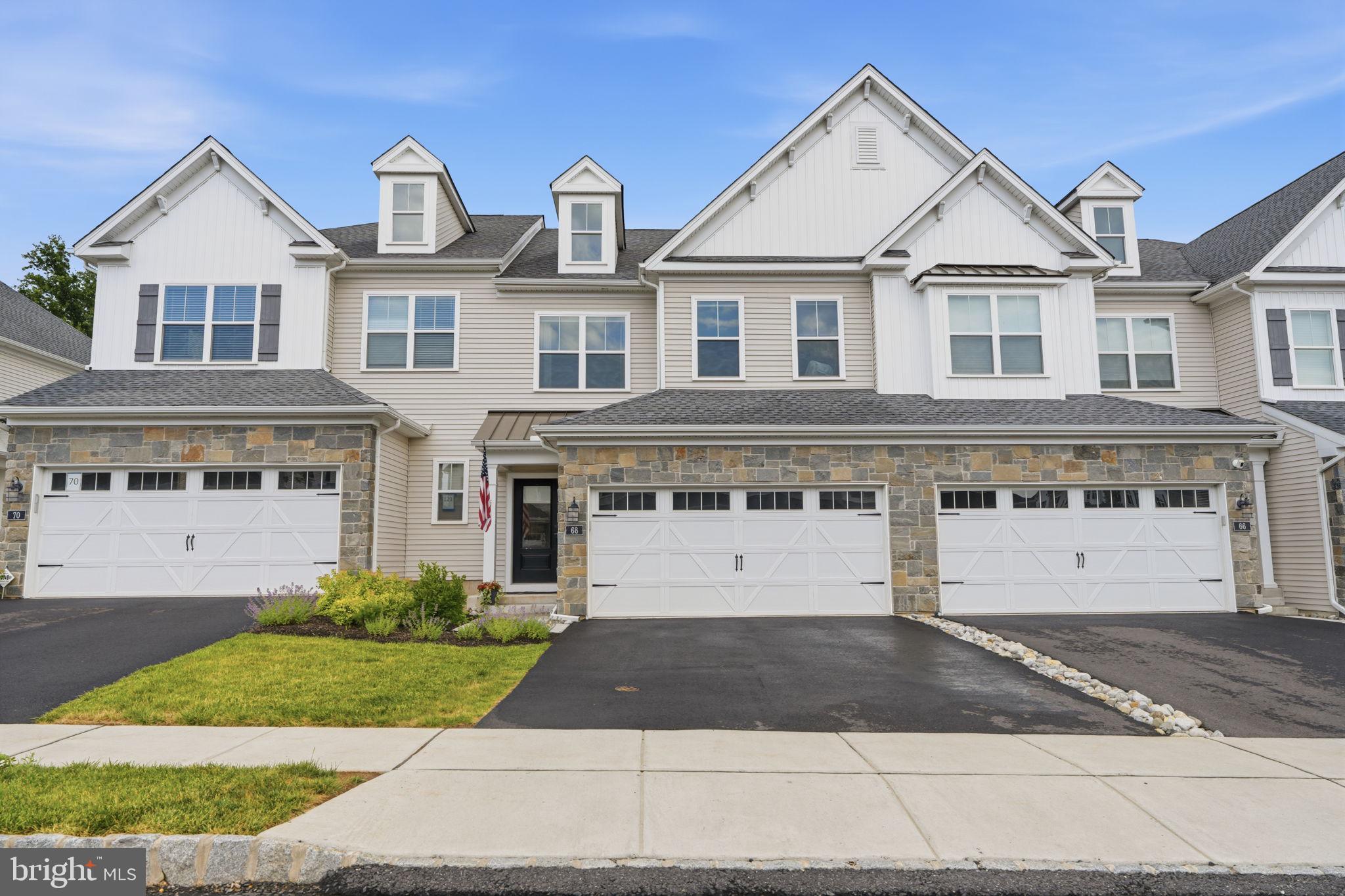 Welcome to this pristine, highly sought-after "Beckett" model in the Reserve at Spring Mill, perfectly situated on a premium lot backing directly onto the scenic Spring Mill Golf Course in Northampton Township. Located within the award-winning Council Rock School District, this exceptional home seamlessly blends luxury, comfort, and modern design.

Step inside to an elegant open-concept floor plan adorned with upgraded plank flooring across the entire main level. The chef-inspired designer kitchen is a true centerpiece, boasting quartz countertops, a stylish tile backsplash, an expanded center island, premium upgraded appliances, soft-close cabinetry, and a walk-in pantry with custom shelving. Bathed in natural light, the adjacent breakfast room features a spectacular triple door that opens to a maintenance-free 12’ x 12’ deck with a retractable awning—your private oasis for outdoor dining and sweeping golf course views. The inviting Great Room offers a cozy ambiance with a gas fireplace and a sophisticated custom wainscoting accent wall.

Ascend the elegant main staircase—featuring oak treads, painted risers, and a beautiful carpet runner—to the private quarters. The luxurious primary suite serves as a peaceful retreat, complete with an elegant tray ceiling, a spacious walk-in closet, and a spa-like en-suite bath with an upgraded vanity and shower. Two additional generously sized bedrooms feature custom details: Bedroom 2 showcases a modern shiplap accent wall, while Bedroom 3 offers custom built-in closet organization, with both rooms equipped with recessed lighting and ceiling fans. A stylishly upgraded hall bath with a double vanity and a conveniently located second-floor laundry room complete this level.

The beautifully finished basement expands your living space exponentially, featuring a versatile entertainment area, a convenient powder room, and abundant storage. Double glass doors lead into a dedicated home office complete with a  window, making working from home an absolute pleasure.

With 3 bedrooms, 2 full baths, 2 powder rooms, and a 2-car garage, this turn-key residence offers a premium lifestyle in an unbeatable location. Schedule your tour today!