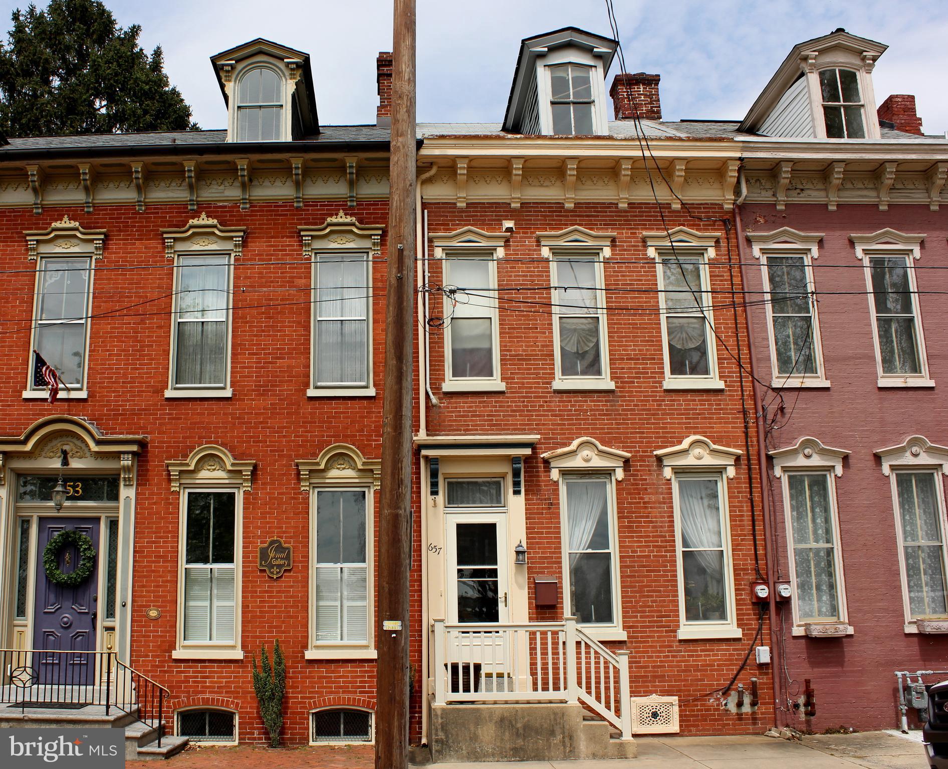 Well maintained townhome on Locust St.  Plenty of on street parking.  Large living room with 10 ft ceilings, updated bathroom, fenced yard, potential 4th bedroom on third floor.