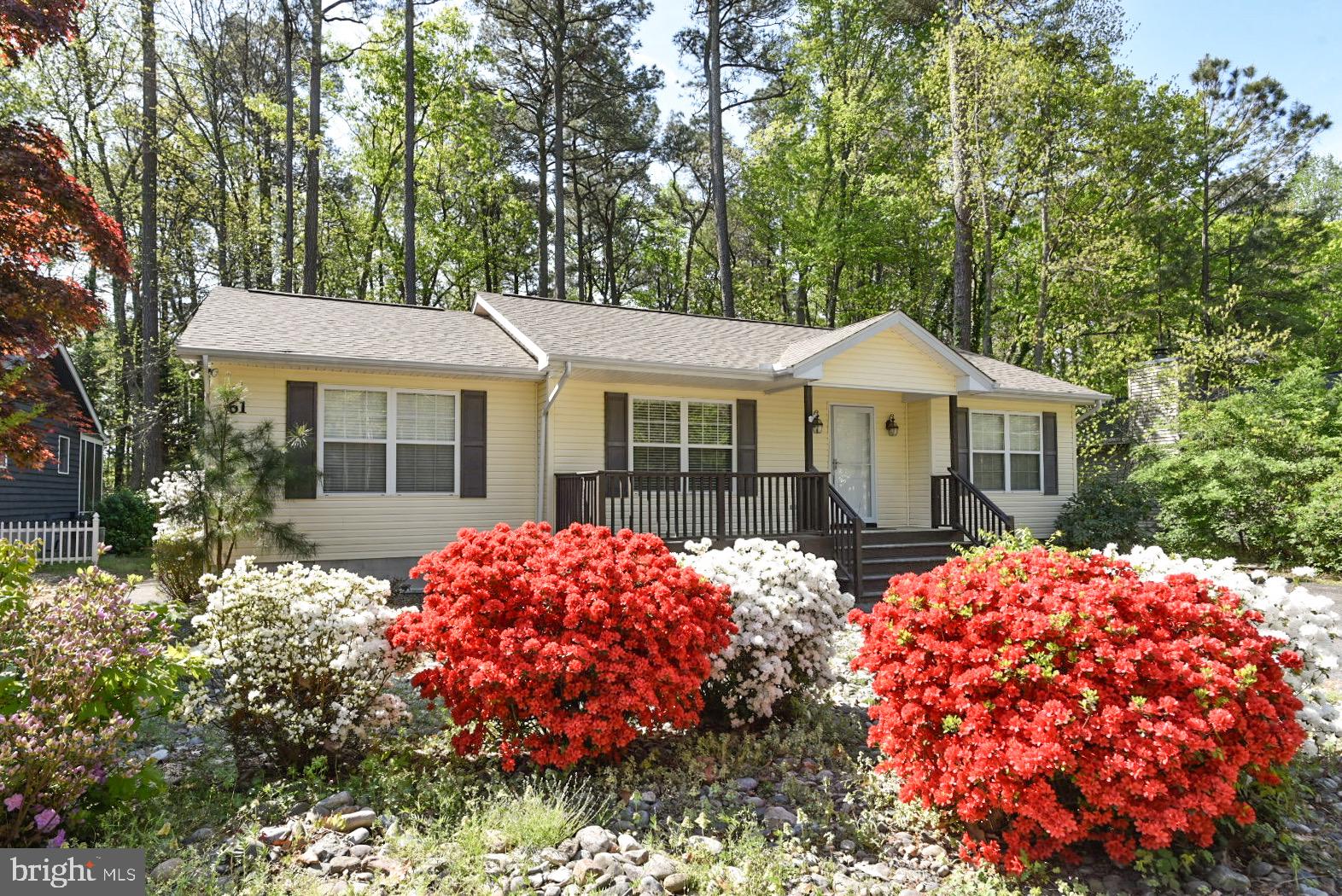 Spacious and open floor plan designed for easy living and effortless entertaining . This inviting home features 3 generously sized bedrooms and  2 full baths  * Sliding glass doors open to a large screened porch * The charming front porch is perfect for enjoying your morning coffee or relaxing  in the evenings with your favorite beverage  * Roof replaced in 2022 with 50 year warranty * Central Heat /AC for year round comfort *  Abundant closet space and storage shed for all of your beach and boating essentials * You'll love being part of a vibrant waterfront community offering exceptional amenities including 5 pools, tennis, pickleball, yacht club, restaurants,  Robert Trent Jones, Sr designed championship golf course  as well as a  beachfront pool, parking and restaurant in Ocean City *  EVERYTHING you need to embrace the Coastal Lifestyle to the fullest *  Ocean Pines is located just 5 miles inland from Ocean City and blends wooded serenity with Coastal Charm * Fresh paint, new carpeting in bedrooms... Let's make this your home yours *