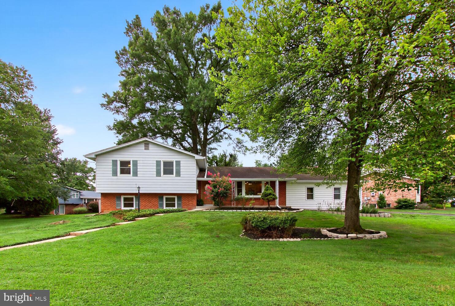 DON'T MISS THIS wonderful freshly painted split level with numerous updates and highly sought after features including 2 car garage with expansive driveway, large lot, screened porch and walking distance to houses of worship & public schools(Churchill Schools). This ever popular model features a large updated tablespace kitchen, gas heat, Pella replacement windows(2023),new dishwasher(2025), leaf filter gutters, 2023, beautiful hardwood floors on main and upper levels, renovated bathrooms, 4 bedrooms and total 3 baths, family room with fireplace, office and more. Laundry is several steps down from main level. Front door and slider to porch have been  replaced. Showings will begin on Friday August 22. OPEN HOUSE ON SUNDAY, AUGUST  24TH 1-4PM. IF BRINGING CHILDREN-PLEASE SUPERVISE CLOSELY.