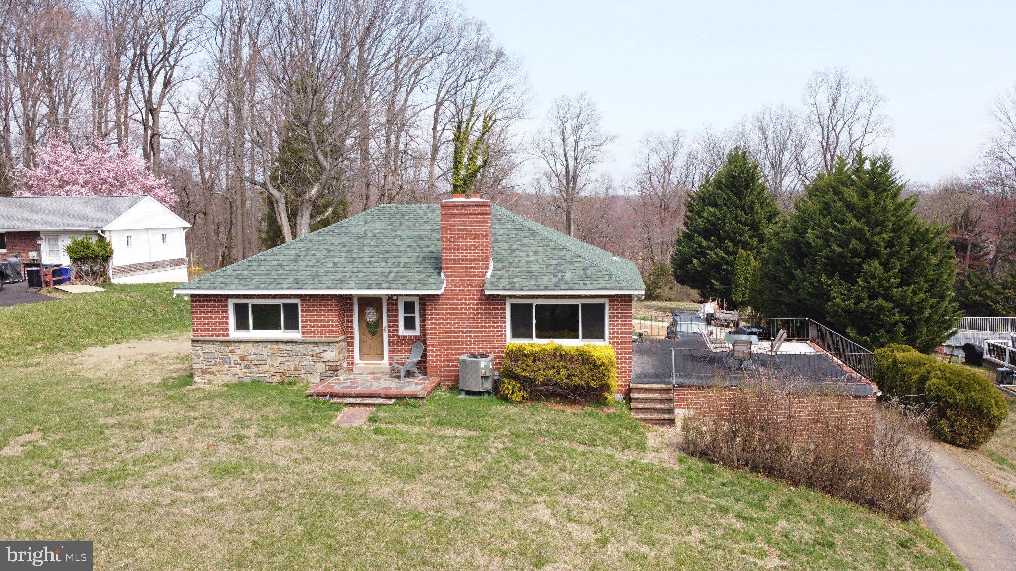 Nestled on a serene 5.5-acre lot within the Garnet Valley School District, this rare ranch home offers a unique blend of privacy, potential, and opportunity. Whether you're seeking low-maintenance one-floor living or looking to expand, rebuild, or simply add your own personal touch, this one has it all! Newer roof, heat pump, central AC--all new within the last four years--providing a worry-free foundation for your vision. Move right in or take advantage of the ample space to build the home of your dreams. The property also offers possible subdivision potential--consider selling off unused land for added value or future investment (buyer to confirm with township). Enjoy peaceful mornings walking the private trail with a stream (not a flood zone or wetlands) through the wooded portion of your property. Land behind the property will not be built on, ensuring your backyard will always remain a natural retreat. No HOA, highly desirable location close to schools, major roads, and tax-free Delaware shopping,