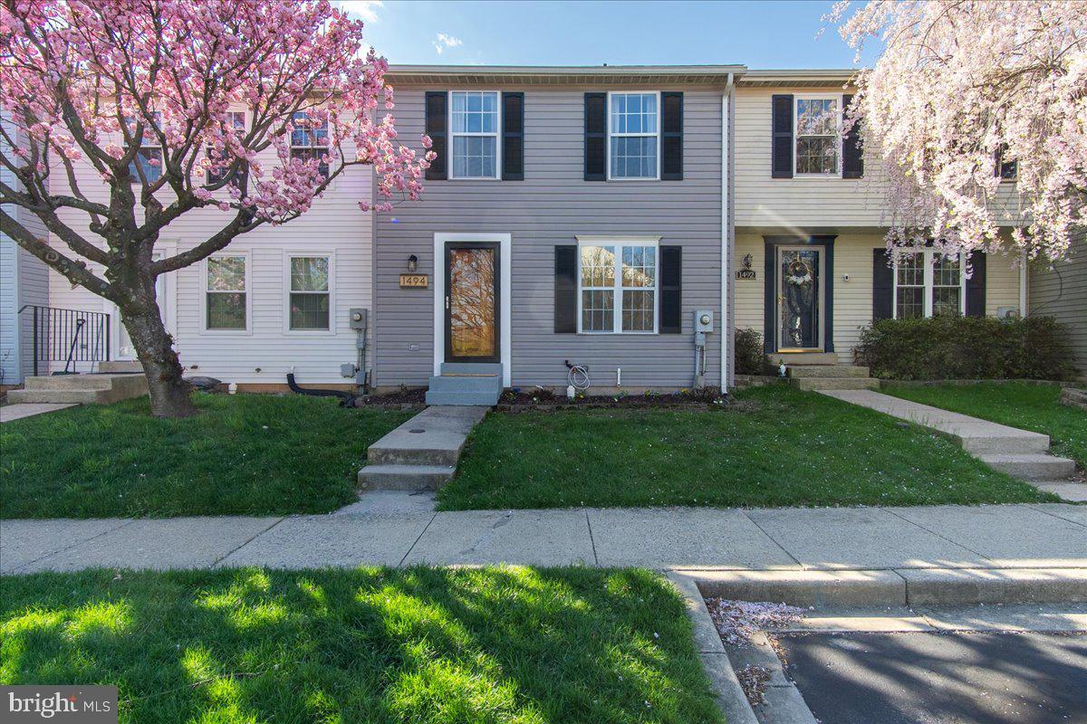 Welcome home to this lovely UPDATED MOVE-IN ready townhouse! This wonderful home offers a gorgeous kitchen with stunning granite countertops, stainless steel appliances and a striking showpiece, one of a kind, beautiful kitchen island. Main level offers LPV flooring, Family Room/ Dining Room combo with a walk out to a Large Deck and a Fenced in Backyard. Perfect for grilling, lounging or entertaining. NEW neutral carpet through out! Upstairs offers 2 large bedrooms with a Full bath. Primary Suite offers 2 large closets with custom closet organizers. The basement offers a Bedroom, Full Bath and a Kitchenette for either muti generational living or a possible house share rental space.  There is also a separate laundry room with storage available. Washer/ Dryer included. 2 Reserved Parking Spaces with several visitor parking spaces as well. Minutes from Historic Downtown Frederick's Shopping, Restaurants, Breweries, Arts and stunning Carrol Creek. Close to Marc train, 15N, Wegmans, YMCA and more! MUST SEE!