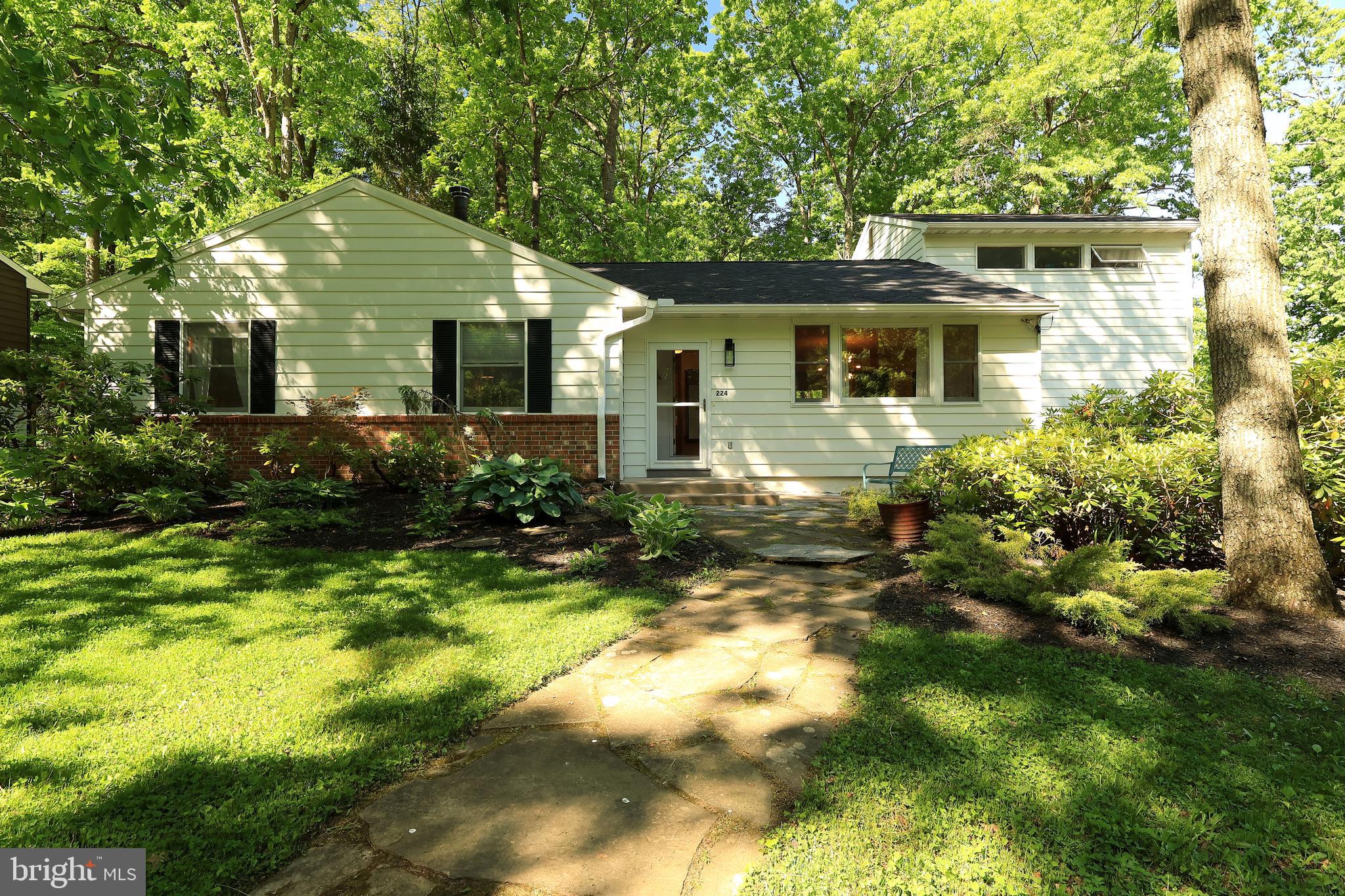 Light, bright and bringing the vibes! You will not want to miss this charming 3 BR 3 BA Park Forest home. Spacious ranch style home with a twist – a 2 story addition which brings the living area to 2500sf. Generous eat in kitchen with new appliances and sink and lots of storage. Beautiful hardwood floors throughout the main level. White walls and lots of windows make this home a naturally bright environment to show off your plants and artwork. The living spaces are truly flexible – they are now a cozy den, spacious dining room and very large family room. You can choose how these spaces would best reflect your lifestyle. 3 bedrooms on main level. Full bath on hall has been completely remodeled. Primary bedroom has a private bath with tile and glass shower. Who will claim the coolest spot in this home? The owners refer to is as “the tower”– the second floor of the family room addition. Makes an amazing office or studio with windows all around bringing in the light and treetop views. Lower level with more flex space and a full remodeled bath. New large deck spans the rear of the home with access from kitchen and addition. Yard with lots of native perennials and access to Park Forest greenspace area. Brand new roof. One car garage and carport. So much to love about this home – you must take a look to see all of the details!