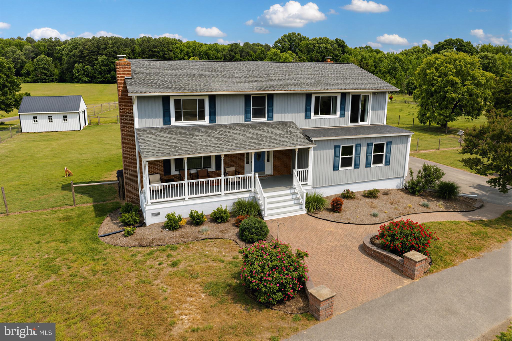 Timing is everything!!!! Looking for a horse farm or country relaxation that is turn key? Here it is. Located on 22.73(+-) flat useable acres. The home has 3142 square feet, 4 Bedrooms, 3 Full Bathrooms, Kitchen cabinets and countertops approx 4-6 years old, Kitchen refrigerator approx 2 years old, oversized front porch and a 12X15 screened porch on back of house facing horse barn and pastures, unfinished walkout basement, windows, siding, and shutters replaced in approx 2022, new well pump installed, mound system installed in 2022. Heat pump with oil backup, duct work, oil tank, and sump pump replaced around approx 2022. One car attached garage and 3 car carport with parking pad.  Generator back up and RV hookup installed 2022.  In 2022-2025 (+-)5,000 ft of Fencing installed- 6 acres of pasture divided into 3 pastures with 3 paddocks designed for easy turnout and rotational grazing. Fencing includes 8ft pressure treated post, 4 ft no climb fence and electric braided wire which is run off Solar Boxes! The 16 ft gates insure easy equipment access. The barn is 60'X70' with a center aisle includes seperate smeco meter, 5 stalls, hay stall and tack/feed room with tongue and groove, gutters and down spouts. Two hydrants near barn for grooming and water.  Don't miss the stone dust riding ring  approx 80' X 120'. There is also a hay field of (+-) 7acres, a beautiful stocked pond  which the Canada geese enjoy.     
If you love the outdoors this is it!!! Horse ready, nature, deer/waterfowl, turkeys, stocked pond. Also, a shooting range!