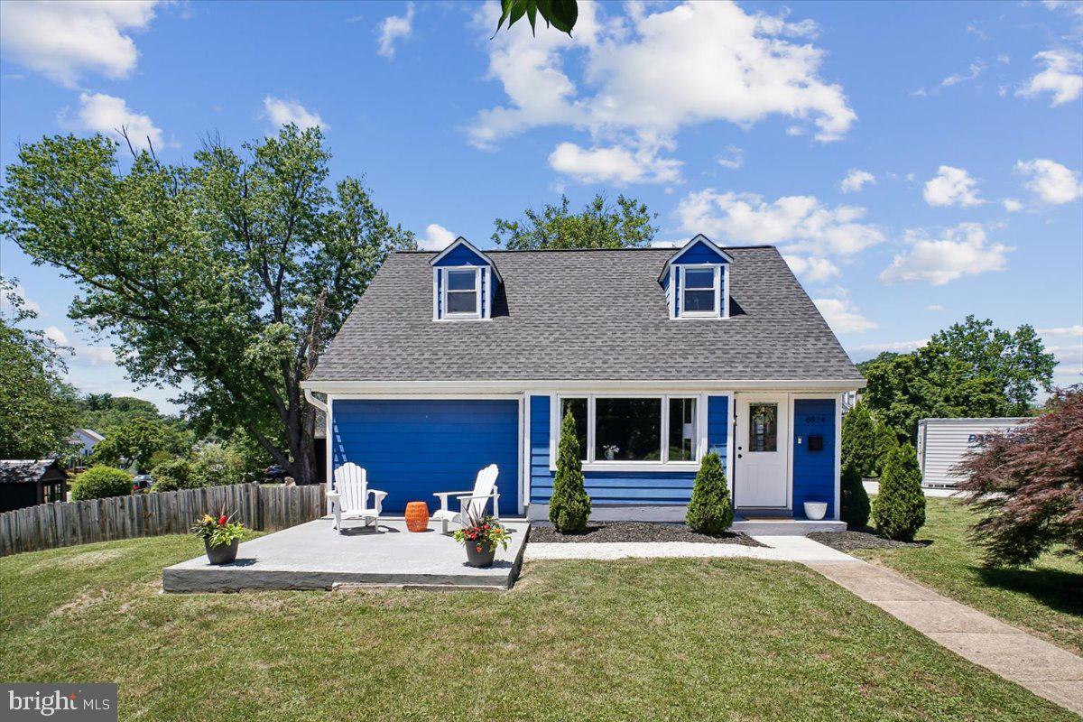 Perfectly situated on a 1/4 acre corner lot in sought-after Bucknell Manor, this gorgeous home was renovated from top to bottom in 2021.  It’s a bright and cheerful, charmer!  A 4-bedroom, 2.5 bath Cape, filled with natural light, featuring an open, modern floor plan centered around a stunning kitchen with stainless steel appliances, stone countertops, and a large island with seating for four.  The main level offers a spacious living area, dining space, separate laundry room, powder room, and a private primary suite complete with a walk-in closet and updated en-suite bath. A versatile fourth bedroom provides the perfect space for a home office, den, or guest room. Upstairs, you'll find two additional generously sized bedrooms, a reading nook and a beautifully updated full bath.  Hardwood floors run throughout. 2021 improvements include new roof, siding, HVAC, windows, fencing, lighting, fixtures, and appliances.  More recent updates include a new paved private driveway, an updated outside living space and fresh paint.  Outside, the expansive corner lot features a large front yard and a fully fenced side and rear yard with a patio—ideal for relaxing, entertaining, or play.  Conveniently located just moments from the Mt. Vernon Recreation Center and the scenic Mt. Vernon Trail, with easy access to Old Town Alexandria, the Pentagon, Washington, DC, and Fort Belvoir, this turn key home offers the perfect combination of style, comfort, and convenience. Just move in and enjoy!  First Open Sunday, June 7, 12-2pm.
