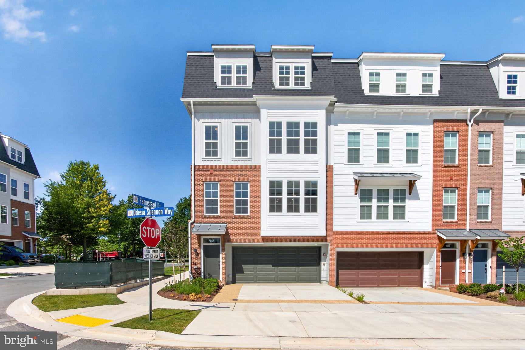 Move in Ready Elevator Townhome.  Lot 620 is a 4 level, 3 BR, 3.55 BA end home , 2-car side by side parking garage with 2 parking spaces in the driveway, and rear yard and  rooftop terrace.   Tons of additional upgrades and overlooks park too.  The HOA fee includes access to the Barn - a Community Center with Fitness Room, an  outdoor Pool Area, Fire Pits and seating as well as a playground and 1.25 acres of walking trailsl!