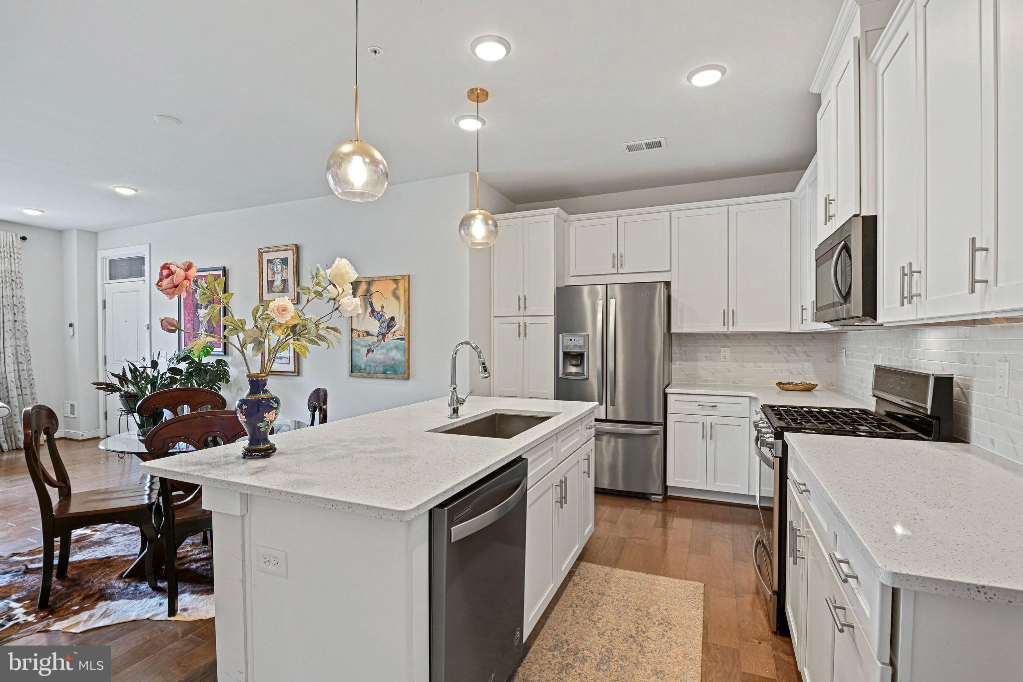 Contemporary condo-townhome—built in 2019—boasts 3 bedrooms, 2½ bathrooms, and about 1,510 sq ft of thoughtfully designed space in the vibrant Arrowbrook community.

Step inside to an open-concept main level featuring a spacious living and dining area, luxury Hardwood flooring, and a contemporary kitchen with stainless steel appliances, Quartz countertops, and a large island—ideal for everyday living and entertaining.

Enjoy added conveniences like an upper-level laundry room, walk in closet in Primary bedroom, Large Windows, attached 1-car garage with electric charging dock. The community offers walking trails, and is just minutes from Herndon Metro, Dulles Airport, major commuter routes (Route 28, 267), shopping, dining, and more.