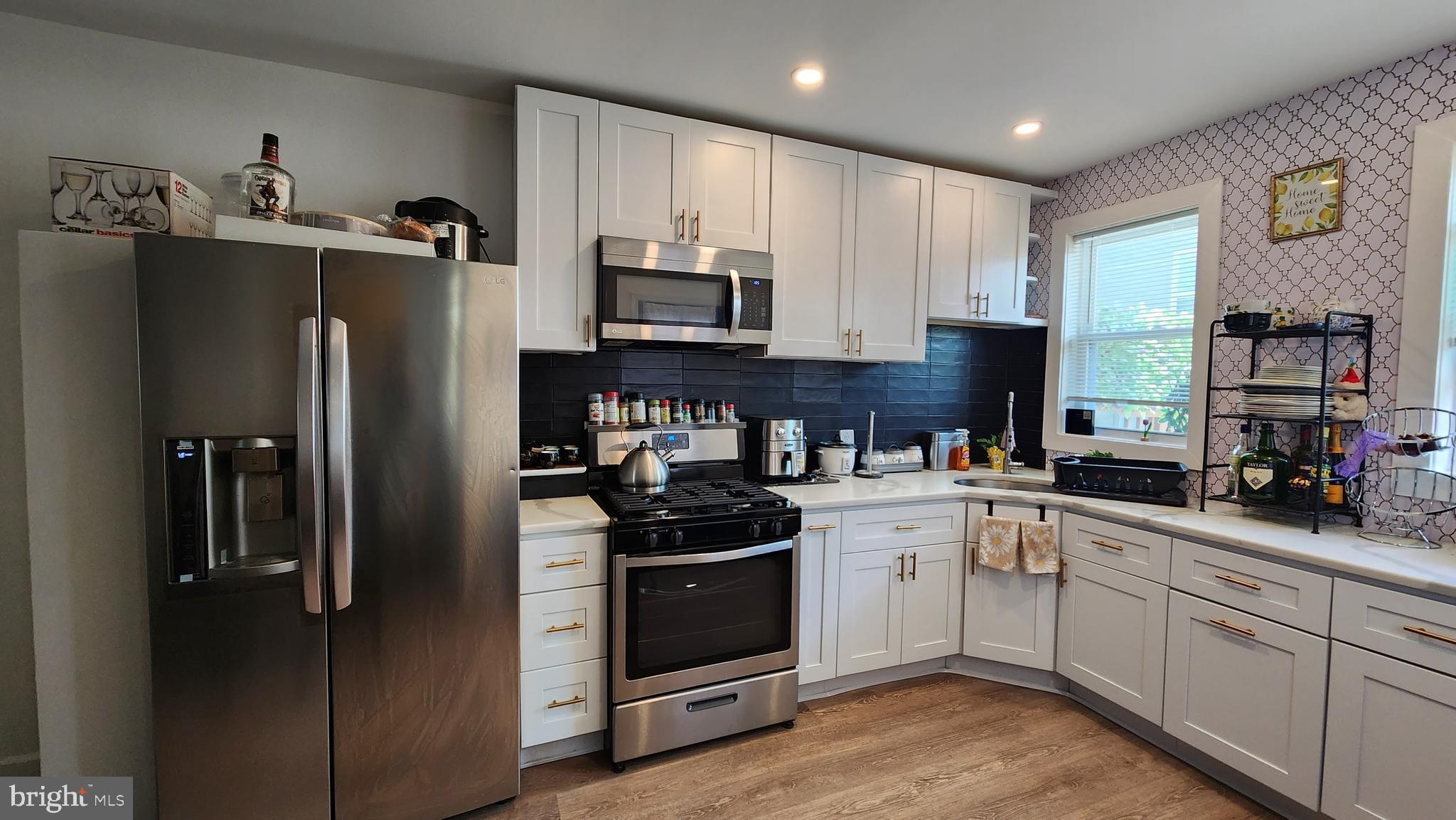 Rent this beautifully stylish, newly-renovated 3 bedroom, 2 bathroom house with private parking, conveniently located in the Whitman section of South Philadelphia. Tucked away on a small quiet block but located close to everything imaginable. Less than a mile from Christopher Columbus Blvd,  near the Walt Whitman Bridge, you are close to the Navy Yard Area,  Sports Arenas and Casino Area, and Plenty of shopping plazas, Restaurants, and Entertainment. Located near both I-95 and 76, you are minutes from the airport and New Jersey, plus plenty of public transportation for commuting to Center City and other sections of the Metropolitan Area. 

Inside of the townhouse styled rowhome features an open floor plan with sitting area in by the entrance vestibule, a stylish half bathroom along the side of a spacious living room dining room combination that opens to the new fully equipped upgraded kitchen with stainless steel appliances and quartz countertops throughout. From the kitchen is a gracious new deck, perfect for outdoor entertaining or enjoying a relaxing day. Downstairs features a newly finished full basement with laundry area, leading out to the rear driveway for private parking.  Upstairs three nicely sized bedrooms with an upgraded full bathroom with a luxurious marble vanity. For added comfort the home has new central-air, a skylight, and ceiling fans. All utilities are new plus upgrade 200amp service and new electrical throughout. 
Call and Apply Now and move in before the Holiday Season.