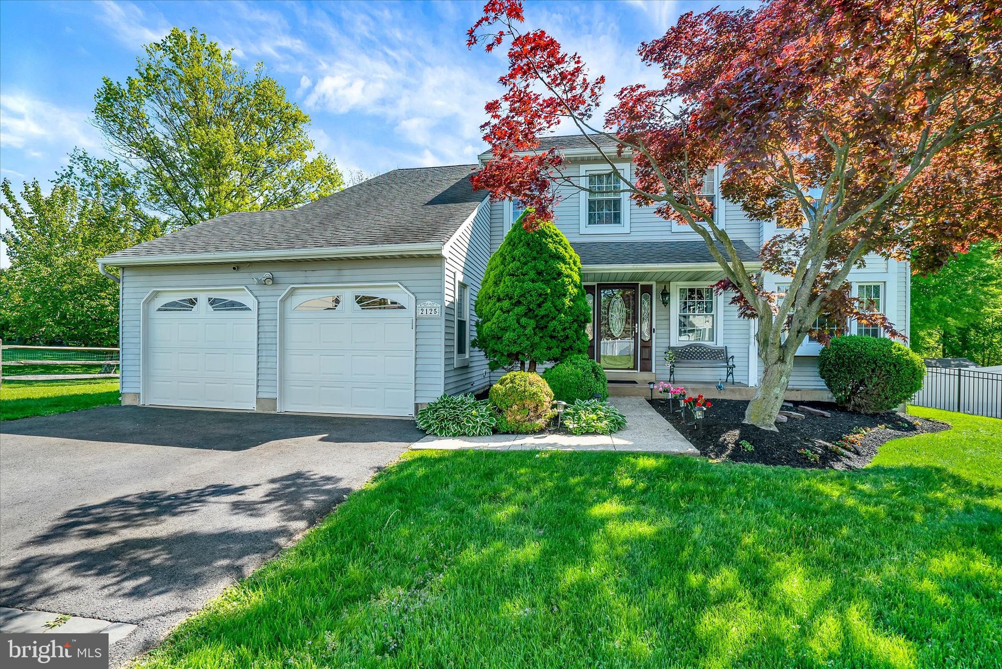 Pride and ownership are evident in this lovely four Bedroom two and a half bath home  in the highly sought after Springbrook neighborhood in Warrington Township. As you approach the welcoming front porch you will step into the sun drenched 2-story foyer. This home offers the perfect blend of comfort, space and functionality. The nice living room with a triple window allows a great deal of sun light.  The formal dining room is perfect for holiday meals or special occasions. There is a perfect office addition with plenty of light with a cathedral ceiling. The kitchen will be a chef's delight. Beautiful light color cabinetry, gas cooking, gorgeous granite countertops, recessed lighting and center island. A separate breakfast area is perfect for family casual meals looking out to the scenic backyard. Step down into the cozy expanded family room and a rear door leading to the wonderful fenced in yard. The outdoor space is very peaceful and beautiful, sit on your patio and enjoy.  Completing the first level is the large laundry room, mud room, access to the 2 car garage and powder room. The second level features a primary suite with double doors, cathedral ceiling and sunburst window. The primary bath with custom tile stall shower, double sink and soaking tub. There are 3 other large bedrooms all with ample closet space. A full hall bath with tub/shower and linen closet complete this level. If this isn't enough space there is a fully finished lower level.  This living space is perfect for a playroom, TV/Game room, exercise room.  Conveniently located to all major highways and public transportation. Minutes to Doylestown, fine shops, dining, Bucks County parks and walking paths. Award winning Central Bucks School District. This is a must see.