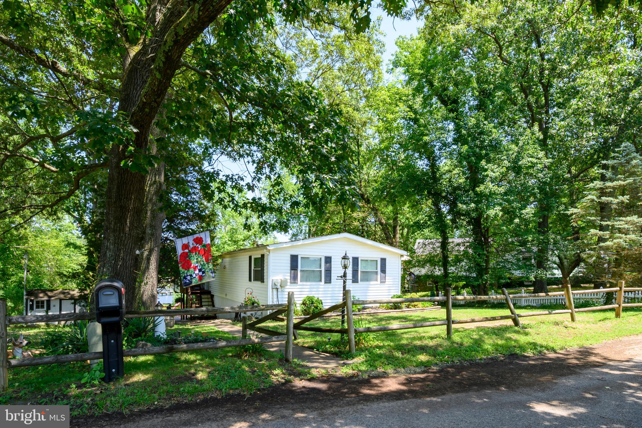 Welcome to waterfront living on the Magothy in Boulevard Park Pasadena!  This includes both 443 and 441 New York Ave, over half an acre.  441 New York was perc'd April of 2024 for up to a 750sqft dwelling. Upper level which includes 3 bed and 1 full bath recently updated with new floor/carpet, windows, paint, and interior doors.  Lower level has potential 4th bedroom or office as well as another full bath.  The basement opens up to the screened in porch, followed by the back deck overlooking views of Grays Creek.  The community of Boulevard Park also offers a public beach, boat ramp, and picnic area.  Atlantic Marina on the Magothy also steps away.