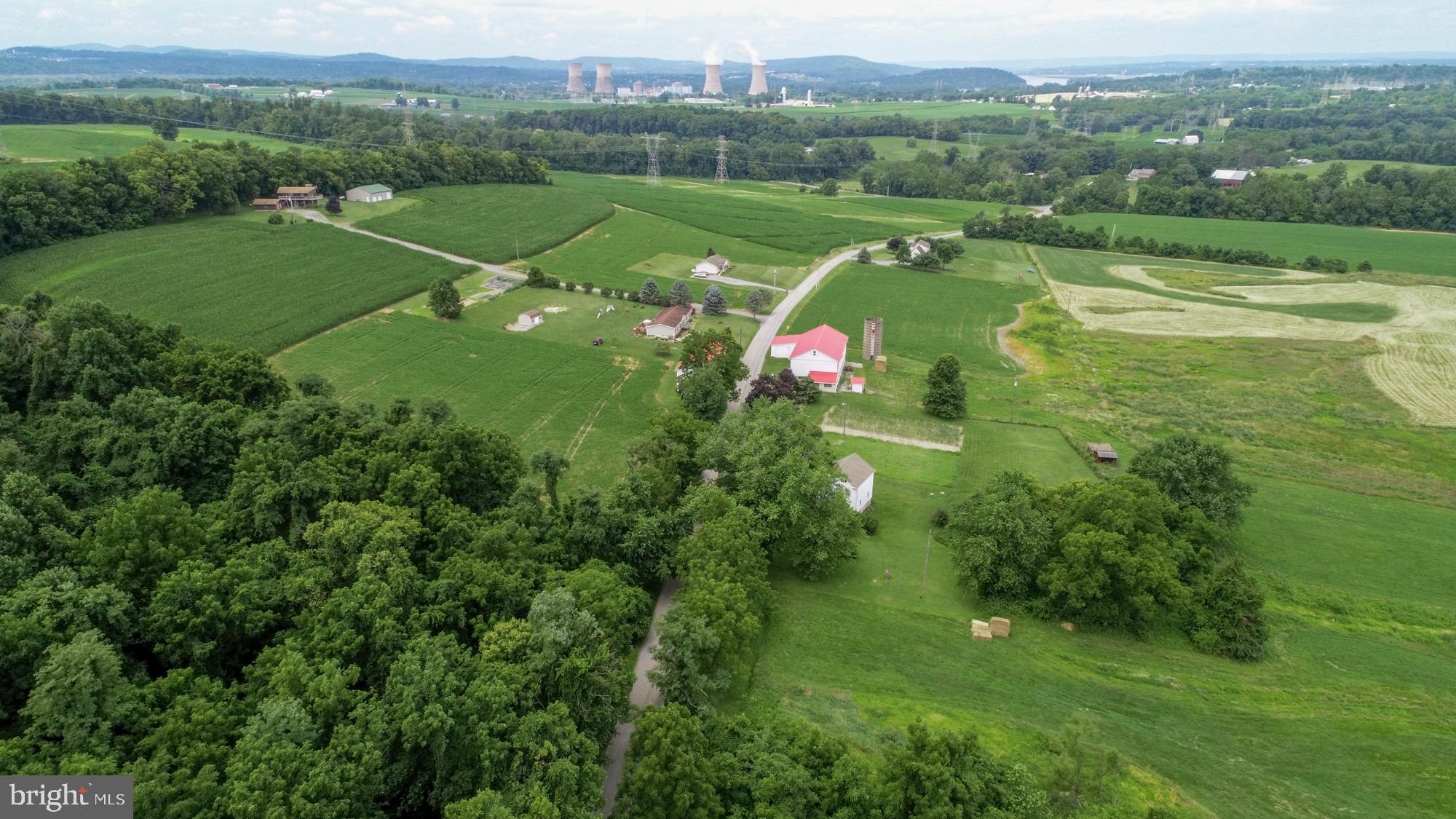Beautiful, Lancaster County, working farm offered for sale.  Family owned since 1943 and enrolled in the Ag Preserve in 2010.  This farm offers approximately 73 tillable acres,  23 pasture acres, and 22.5 acres of woodland.  Large bank barn, 32 stanchions, milk house,former tobacco barn and more!  New sand mound in 1997, House roof 2006, newer metal roof and siding on barn, original milk house, and former tobacco barn.  Crops reserved by Farmer that currently rents the ground.  Tenant may consider future lease with new owners.  PPL owns 3 acre corridor under the power lines.  Annual rent is $100/acre ($300 total).