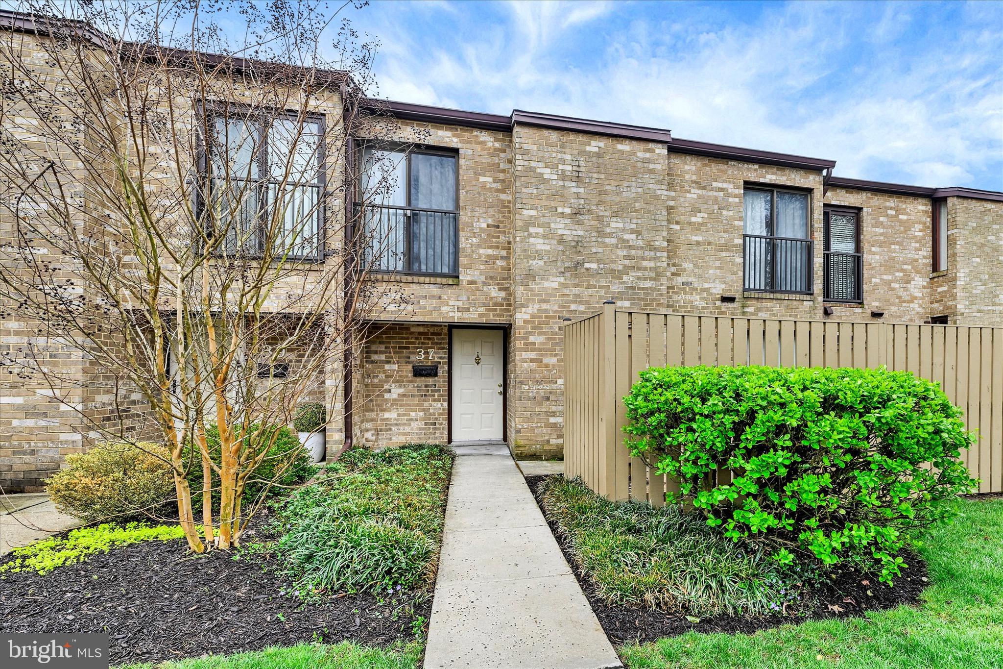 🔥 SELLER INCENTIVE: Seller will pay the first 6 months of condo dues at settlement—a $2,874 value to the buyer! Views like this don't come with condo living, until now. Tucked into one of Topfield's most beautiful pockets, this fully renovated townhouse condo backs to a sweeping open lawn and overlooks the rolling hillside, delivering a sense of peace and privacy that will stop buyers in their tracks. The fully fenced front courtyard and rear patio create rare outdoor living options, whether you're hosting friends, unwinding after a long day, or letting the Fido stretch his legs. Inside, all the details are ready for you. A stunning new kitchen showcases crisp cabinetry, fresh countertops and appliances, while updated flooring, fixtures, and lighting carry that polished, move-in-ready feel throughout every room. The combined living and dining space centers on a striking fireplace, offering warmth and character throughout. The primary suite impresses with generous closet storage and a private bath with walk-in shower. The big-ticket items will keep you for years include: HVAC (new in 2025), water heater (new in 2024), as well as all new appliances throughout. The community features an outdoor pool and tennis courts. Here at 37 Pickburn Court, you only need to unpack and enjoy. All of this, minutes from the shopping, dining, and commuter access of Cockeysville and Hunt Valley. Homes that combine this level of updates, this setting, and this price point don't last. Come see it before someone else makes it theirs.