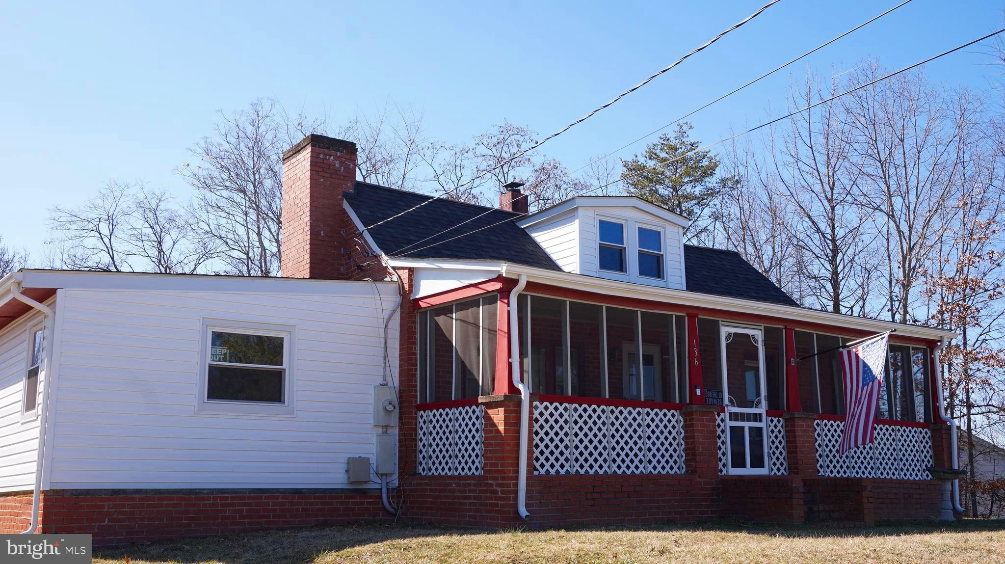 Don't miss out on this home! It won't be available for long. Located just minutes from downtown Fredericksburg, this brick rambler features a spacious backyard and a screened-in front porch. You'll also find a garage, carport, and a cozy fireplace. The backyard is equipped with playground equipment, perfect for families. The siding is only a year old, and the roof is less than five years old. A new septic system was installed in 2018, along with a hot water heater in 2019 and an HVAC system in 2022. The master bath was remodeled in 2024. The washer, dryer, and refrigerator are just a year old, and there's new flooring in the kitchen, hallway, foyer and 8 new windows. Plus, there's a new screened-in porch. With no HOA, this home has incredible potential! Come see it before it's gone!