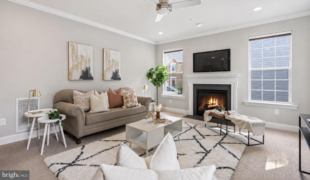 HUGE PRICE REDUCTION! Welcome to your future home—a stunning, move-in-ready treasure nestled on a quaint and quiet cul-de-sac  in one of Howard County’s most sought-after communities. Just six years young, this beautifully maintained 4-bedroom, 2.5-bath sanctuary offers the perfect blend of modern living and timeless charm.

As you enter, let the gleaming hardwood floors guide you through a warm and inviting main level. Imagine gatherings in your light-filled family room, complete with a cozy fireplace that beckons you to relax and unwind. Designed with both everyday living and entertaining in mind, the layout flows effortlessly, offering the ideal backdrop for making cherished memories.

The finished basement adds a versatile space that can transform into your dream home theater, playroom, gym, or guest suite—whatever suits your lifestyle.

Upstairs, discover four spacious bedrooms, including a tranquil primary suite with a luxurious full bath, promising restful nights and refreshing mornings. The 2.5 baths are tastefully updated, ensuring functionality for the busiest of households.

Step outside to find your private haven—a spacious deck perfect for savoring morning coffee, unwinding in the evening, or hosting weekend gatherings. Nestled on a quiet cul-de-sac, this home offers safety and tranquility, with walking trails just steps away for the outdoor enthusiast.

Prime Location Perks:
