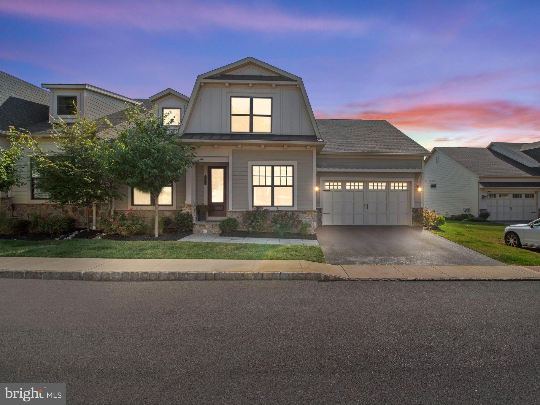 Introducing 320 AP Even Road, a stunning 4-bed, 4-bath carriage home located in the sought-after Tredyffrin/Easttown school district. This NV Homes Bryn Mawr model offers a generous 4514 sq ft of living space in the Wayne Glen Community.

Step inside to discover 10-ft ceilings, beautiful hardwood floors, and a recently renovated kitchen featuring custom cabinetry and top-notch Thermador appliances. The first floor boasts a cozy bedroom, a full bathroom, and a serene primary ensuite with a custom closet. Upstairs, you'll find a lofted area, an additional bedroom, a full bathroom, and a versatile flex room.

Venture down to the basement, where you'll discover a custom bar, a home gym, and a lower level flagstone patio offering breathtaking views of the Glen. This home also includes a two-car garage with custom shelving, an EV charging outlet, and a whole house generator for added peace of mind.

Throughout the house, custom millwork adds a touch of elegance, and the study features custom built-ins for a stunning and functional workspace.

Become a part of a wonderful community that offers low-maintenance living. This property is conveniently located within walking distance of the King of Prussia Town Center and Glenhardie Country Club, and provides easy access to highways 76, 202, and 422 for stress-free commuting. Don't miss out on the chance to make this extraordinary property your new home.