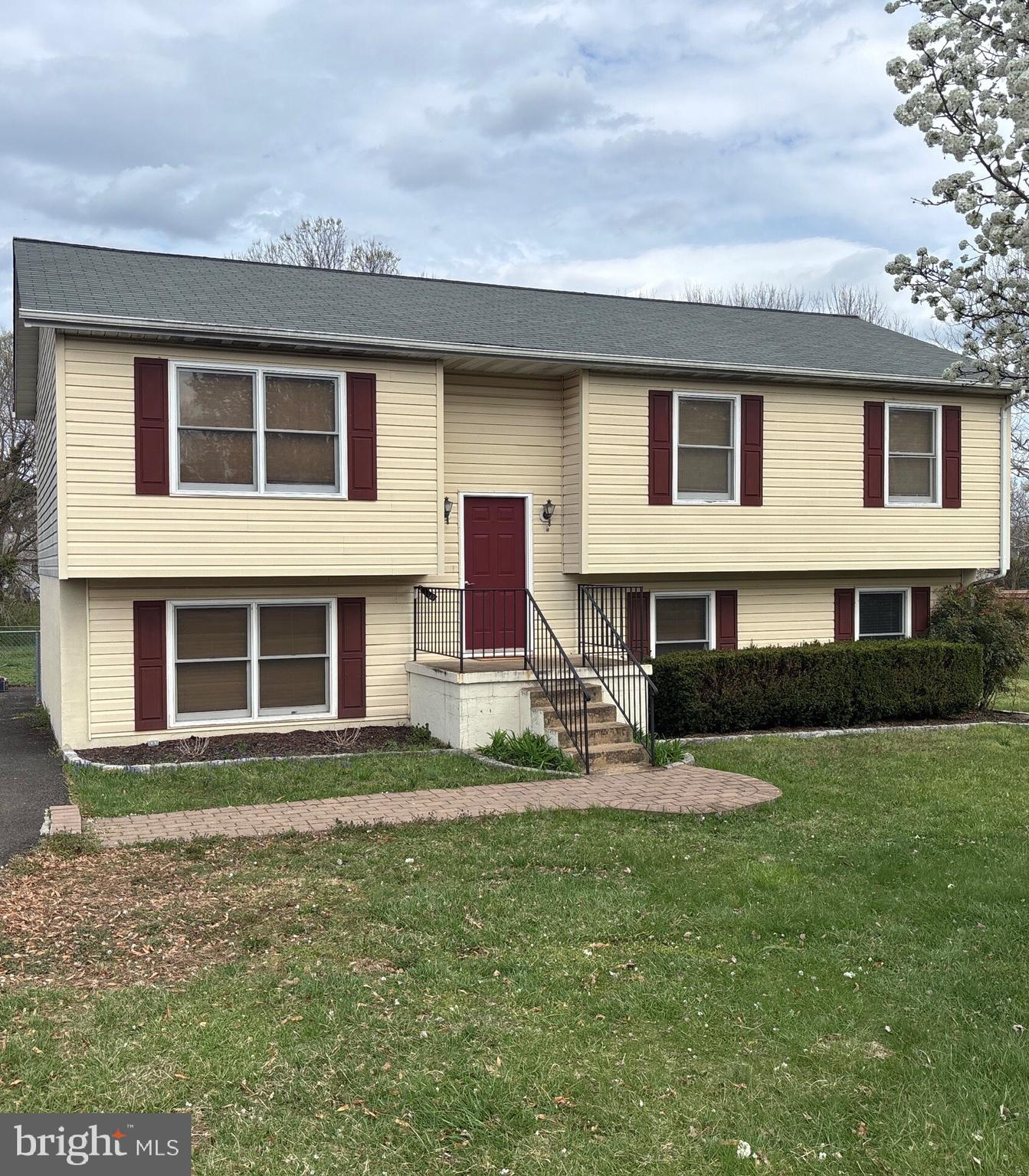 Beautiful split foyer home with a fully finished basement and walkout patio, perfect for entertaining or relaxing. This 4-bedroom, 3-bathroom gem sits on a spacious .5-acre lot and features a remodeled kitchen (2018), new roof (2019), and a new water heater and HVAC system (2020). The fenced yard is ideal for dog lovers, and the home is nestled in a fantastic neighborhood with easy access to I-95 for a day trip to DC or a beach trip down south. Located in a great town with excellent schools, this home offers the perfect blend of comfort and convenience—all at a fantastic price for the area!