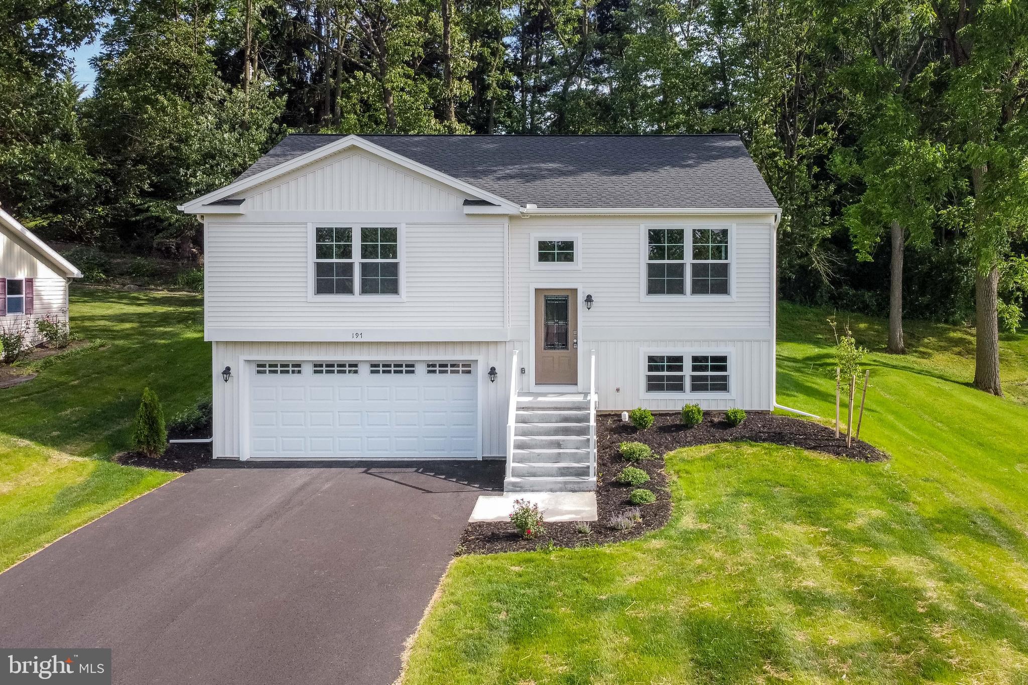 Located in the South Guilford Hills neighborhood in Guilford Township within the Chambersburg Area School District, this home offers convenient access to downtown Chambersburg, shopping, dining, and nearby parks and trails. 

The Gatewood A plan features a traditional split-level exterior with upgraded siding and board-and-batten accents, along with a 2-car front-entry garage. The kitchen includes upgraded cabinetry, quartz countertops, a large island with overhang, and stainless steel appliances, including an electric range, microwave hood, and dishwasher. LVT flooring runs throughout the main living area, second floor, laundry room, dining room, and kitchen. 

The owner’s suite includes a private en suite bath, with two additional bedrooms and a full bathroom. The home also includes a partially finished basement with an egress window well. 

Contact us for more details on this home.
