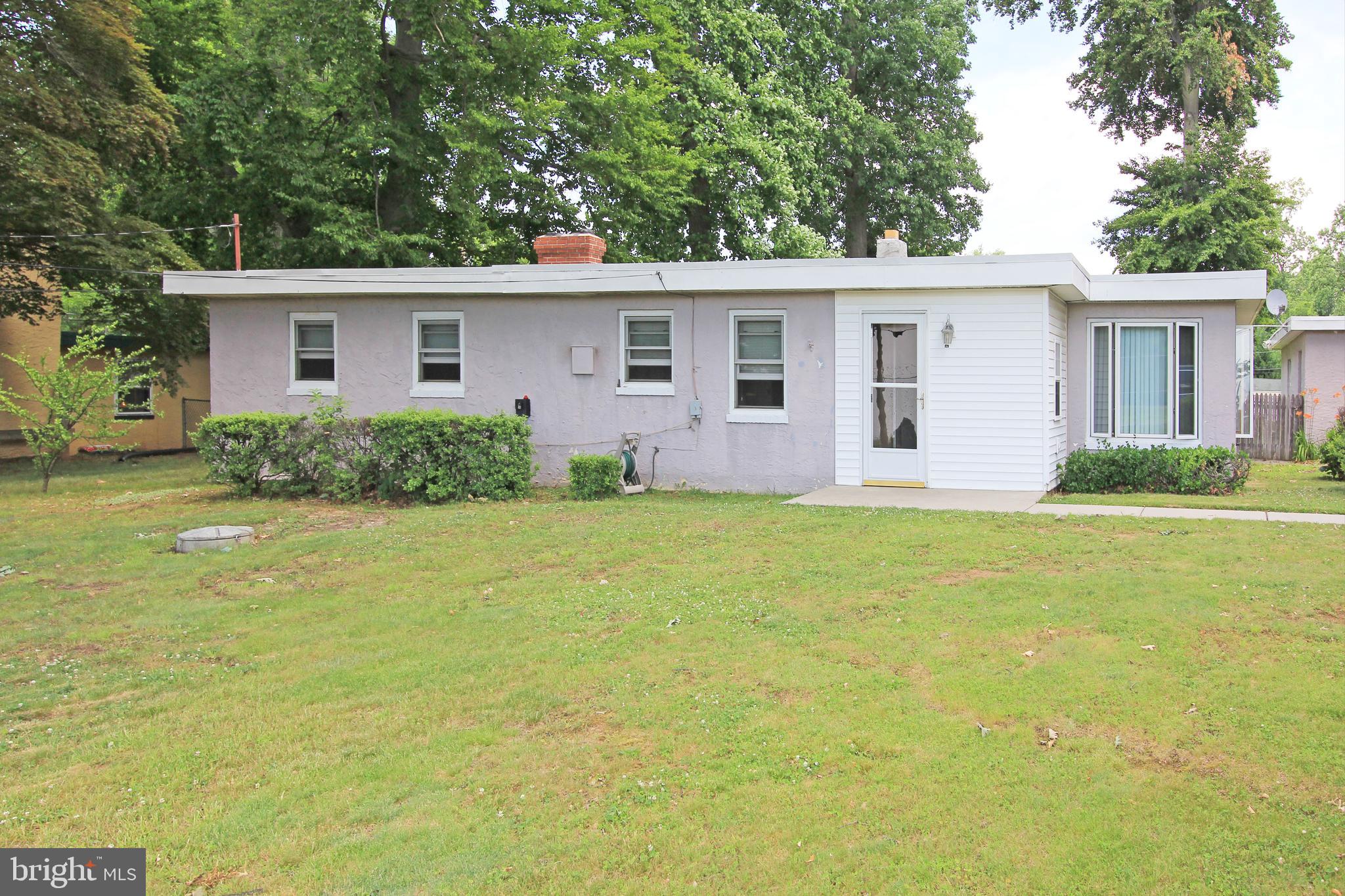 Nestled in a serene setting, this charming ranch-style home exudes warmth and comfort, inviting you to experience a lifestyle of ease and elegance. Built in 1952, this meticulously maintained residence combines classic architectural appeal with modern sensibilities, making it a perfect retreat for those seeking a tranquil yet sophisticated living environment. As you step inside, you are greeted by an inviting atmosphere that flows seamlessly throughout the 1,295 square feet of thoughtfully designed space. Natural light pours in through large windows, illuminating the spacious living areas and highlighting the home's timeless character. The heart of the home features a well-appointed kitchen, ready for culinary adventures. With ample counter space and a functional layout, it's a delightful space for both casual meals and festive celebrations. The adjoining dining area offers a perfect setting for intimate dinners or lively brunches with friends. This residence boasts three generously sized bedrooms, each providing a peaceful sanctuary for rest and relaxation. The full bathroom is tastefully designed, offering both functionality and style, ensuring your daily routines are met with comfort. Step outside to discover the expansive outdoor space, perfect for enjoying the gentle breeze or hosting summer barbecues. The detached garage and spacious driveway provide ample parking for guests, while the side-entry garage adds a touch of convenience to your daily life. Situated on a low-maintenance lot, this home allows you to spend more time enjoying the finer things in life rather than worrying about upkeep. The surrounding area offers a peaceful ambiance, ideal for leisurely strolls or quiet evenings under the stars. This property is not just a house; it's a lifestyle. Experience the perfect blend of comfort, charm, and convenience in a home that invites you to create lasting memories. Whether you're entertaining friends or enjoying a quiet evening at home, this residence is a canvas for your dreams. Embrace the opportunity to make this exquisite property your own and indulge in the luxury of a truly inviting home.