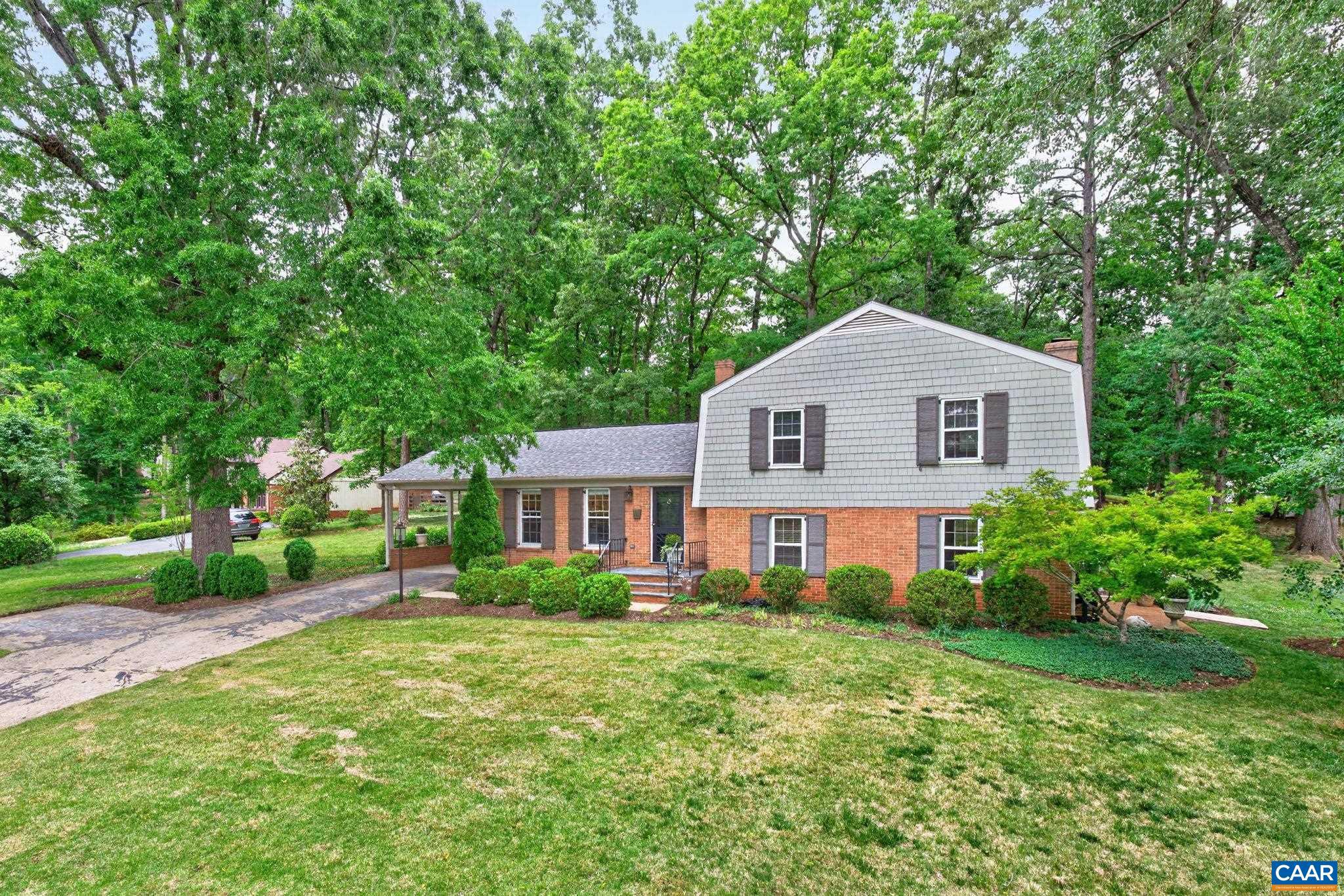 Well loved home in desirable Meriwether Hills only minutes from Ivy Elementary. Nestled on.98 shady acres, enjoy this 3 bedroom 3 bath home with newly refinished floors, 2 renovated baths, a sunny eatin kitchen. The cozy family room has a brick woodburning fireplace and adjacent home office.,Formica Counter,White Cabinets,Wood Cabinets,Fireplace in Family Room
