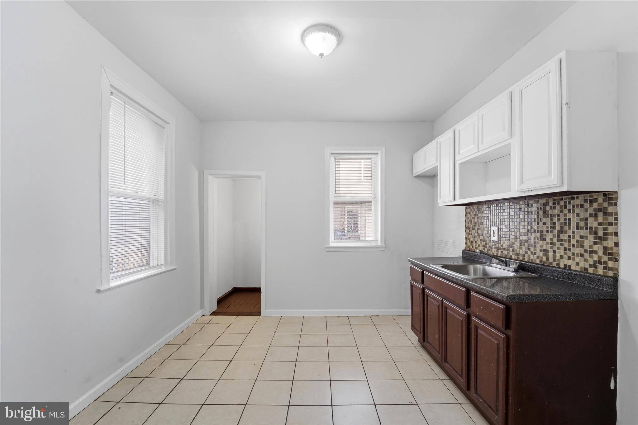 In 2021, this building was approved to be converted into a duplex. The owner never pursued it, but there is a good chance that if you reapply, you could finish the deep basement with a full-size exterior exit into another rental unit. Otherwise, this is a spacious, move-in-ready, oversized single-family home. It is conveniently located in West Philadelphia, offering exceptional potential for homeowners and investors alike. Generous square footage and a flexible layout provide a rare opportunity to customize and add value. Bring your vision and unlock the potential of this well-located property with solid bones and room to grow.