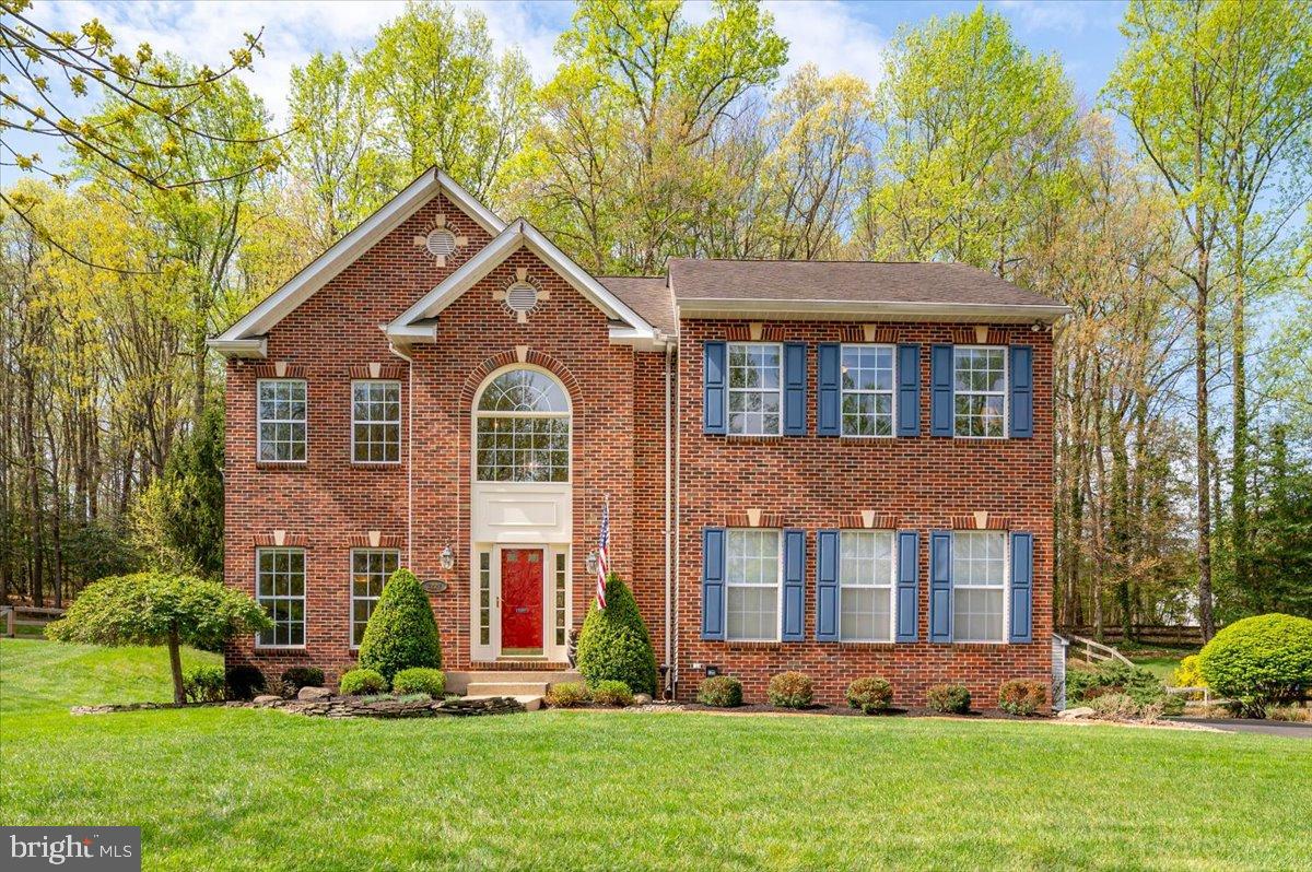 Back on the market and an incredible opportunity to live in Davidsonville with a BRAND NEW ROOF! Welcome to 3227 Homewood Road, ideally located in the highly sought-after Cambria neighborhood, known for its highly regarded schools and welcoming community atmosphere. This beautifully maintained home offers classic brick curb appeal, generous living space, thoughtful updates, and inviting indoor–outdoor living designed for both comfortable everyday living and effortless entertaining.  A soaring two-story foyer welcomes you into an entertainer’s dream floor plan featuring a dedicated dining room with an adjacent sitting room and an open kitchen and family room with a fireplace and skylights, creating a warm and inviting gathering space. The second level offers four spacious bedrooms and a full bathroom in the hallway.  A massive primary suite features cathedral ceilings, an enormous walk-in closet, and an en suite spa bathroom remodeled in 2017 with granite double vanities, a double Jacuzzi soaking tub (no jets), a separate water closet, updated tile and shower finishes, and modern fixtures. The finished walk-out lower level provides flexible living space ideal for recreation, guests, or extended living and includes a full bathroom, rough-in for a future wet bar or kitchenette, storage space, and a utility room.  Outdoor living shines with a screened porch addition (2016) by Patio Enclosures, with the option to convert to a three-season porch. Incredible Amish-built storage shed, beautifully landscaped front and back yard with numerous flowering trees, upgraded motion security lighting, irrigation system, and brand-new Cooper driveway (2026) enhance curb appeal.  Forest conservation provides privacy behind the home with no future development.  Major updates include a new TRANE heating system (2021), a 4-ton Central Air high efficiency 16 seer system (2021) ,  an 11-zone irrigation system with new Hunter control (2024), a sump pump with battery backup. Interior improvements include NEWLY painted throughout the home (2026), NEWLY refinished hardwood floors (2026), modern lighting, and professionally steam-cleaned carpeting (2026). The kitchen features white cabinetry, solid surface countertops, and newer appliances, including a Whirlpool refrigerator (2022) and dishwasher (2023).  Easy to use public water and public sewer. Ideally located with a neighborhood tot lot and playground, near shopping, and commuter routes, this home offers an exceptional combination of space, updates, and location in one of the area’s most desirable communities. Welcome Home!  Professional Photos and Materport walk through will be posted April 14.