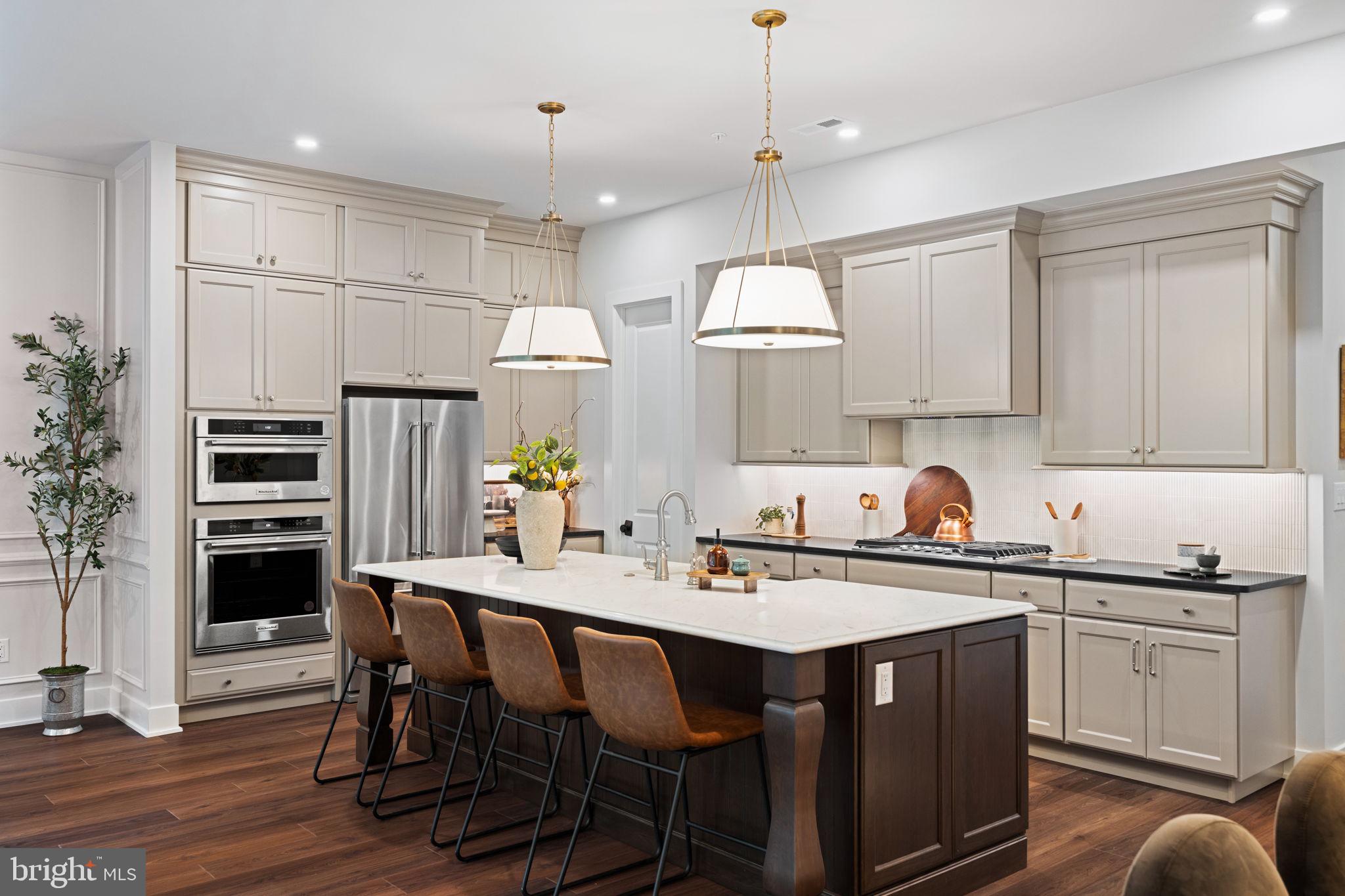 Experience luxury, low-maintenance living in this stunning Harper Grand carriage home at River Trail at Valley Forge with direct access to the Schuylkill River Trail leading to Valley Forge National Historical Park and just minutes from King of Prussia Town Center shopping and dining.  This move-in ready home features a finished walkout basement, chef’s kitchen with built-in appliances, modern finishes, and an open-concept layout filled with natural light. The main level impresses with 10’ ceilings, 8’ doors, oversized great room windows, and a dining area that opens to an elevated composite deck for easy indoor-outdoor living.  Upstairs, the private primary suite offers two walk-in closets, and a spa-inspired bath with dual quartz vanities and walk-in shower. Two additional bedrooms, a full bath, and laundry room complete the upper level.  Enjoy outdoor adventure and convenience in one of King of Prussia’s most exciting new communities. Summer 2026 move-in. Photos are representative of the Harper Grand Model Home, now open for touring!