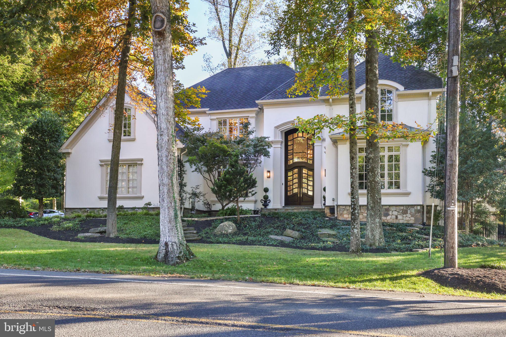 Huge price adjustment.
Welcome to 7016 Bradley Blvd, an exquisite residence that seamlessly blends timeless elegance with modern conveniences, making it an ideal sanctuary for multigenerational living. Situated in a prestigious neighborhood, this home offers a harmonious blend of sophistication and comfort that is sure to captivate.

Upon entering, you are greeted by a grand foyer that flows into an elegant office, a formal dining room, and a spacious, light-filled living area, perfect for hosting gatherings or enjoying quiet family moments. The gourmet kitchen is a culinary masterpiece, equipped with high-end appliances, expansive countertops, and a charming breakfast area by a stone fireplace that invites leisurely mornings.

The primary suite, located on the main level, is a true retreat featuring opulent silk wall paneling and custom drapery that exudes luxury. The suite's brand new marble bathroom boasts every imaginable upgrade, offering a spa-like experience within your own home. Complementing this retreat is a large walk-in closet with built-ins, high ceilings, and skylights that flood the space with natural light.

Designed with extended family in mind, the home features a versatile basement with an extra-large bedroom that offers privacy and convenience, with direct access from the garage. This space is perfect for guests, in-laws, or an au pair suite. 

Upstairs, the additional bedrooms are serviced by back stairs that lead directly to the lush, beautifully landscaped backyard. One of the large upstairs bedrooms offers the potential to be converted into a second primary suite, providing flexibility to accommodate diverse living arrangements. This thoughtful design ensures that each family member enjoys their own private retreat while remaining connected to the heart of the home.

Located just moments away from schools, upscale shopping, and fine dining, 7016 Bradley Blvd is not just a home, but a lifestyle. Don't miss the opportunity to make this extraordinary property your new address and experience the epitome of luxury living.