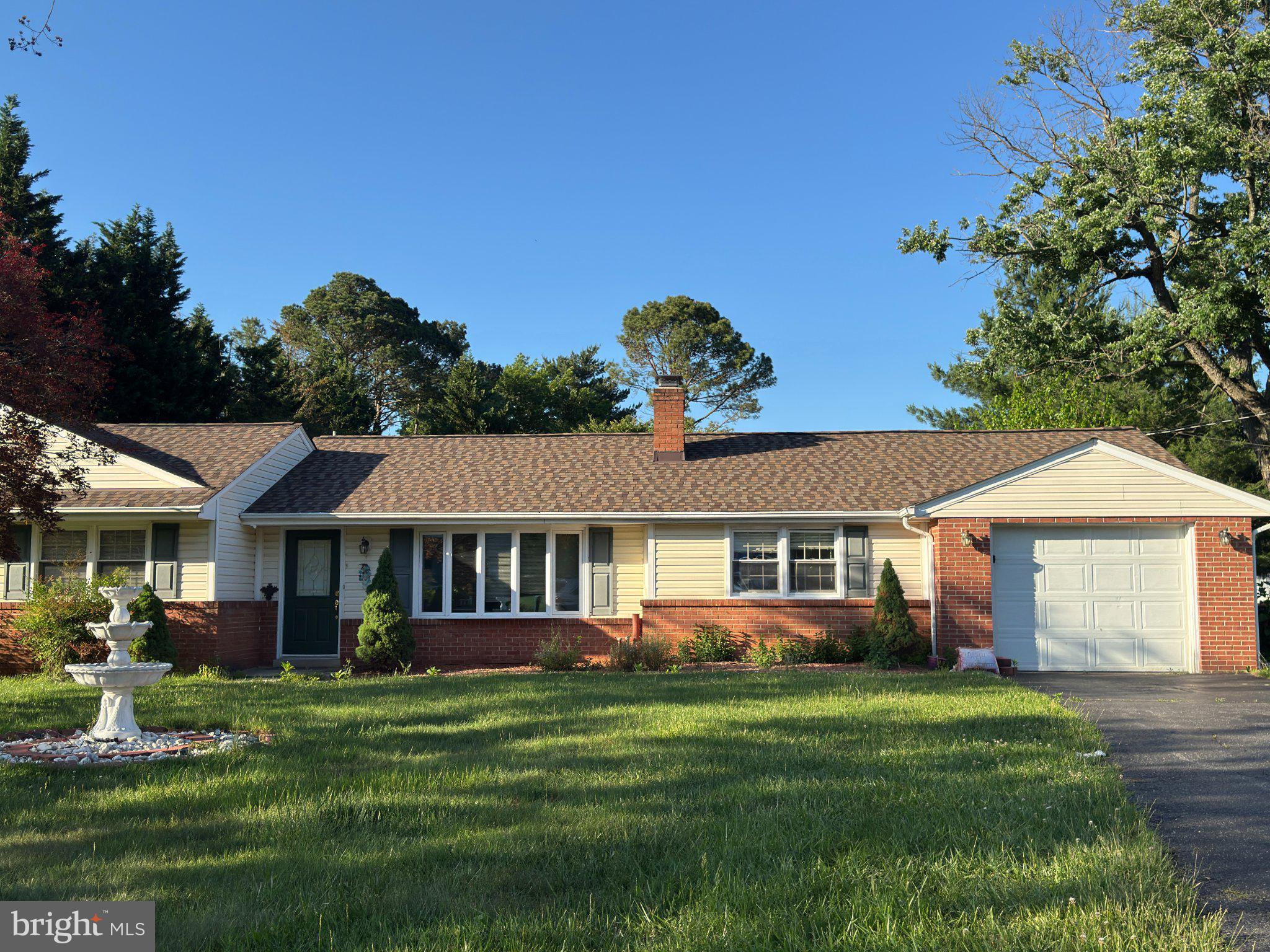 Welcome to this beautifully maintained and thoughtfully updated home offering the perfect blend of charm, comfort, and functionality. This spacious residence features an expanded layout with a stunning rear addition that includes an upgraded kitchen with newer appliances, a huge sunroom filled with natural light, and a generous family room designed for gathering and entertaining.

The sunroom is truly the heart of the home—surrounded by windows and overlooking nature, it creates the perfect space to relax year-round. Step outside to an extra-large deck and enjoy the fully fenced, flat backyard complete with a storage shed—ideal for entertaining, play, or peaceful evenings outdoors.

Inside, beautiful wood floors flow throughout much of the home, while comfortable bedrooms provide warmth and privacy. The inviting fireplace adds cozy charm to the living space. The framed lower level offers incredible potential, featuring an additional bedroom, half bath, rear entrance, and ample room to create extra living, recreation, or workspace.

Conveniently located in a welcoming neighborhood near parks, schools, and everyday amenities, this home offers space, comfort, and endless possibilities for its next chapter.
