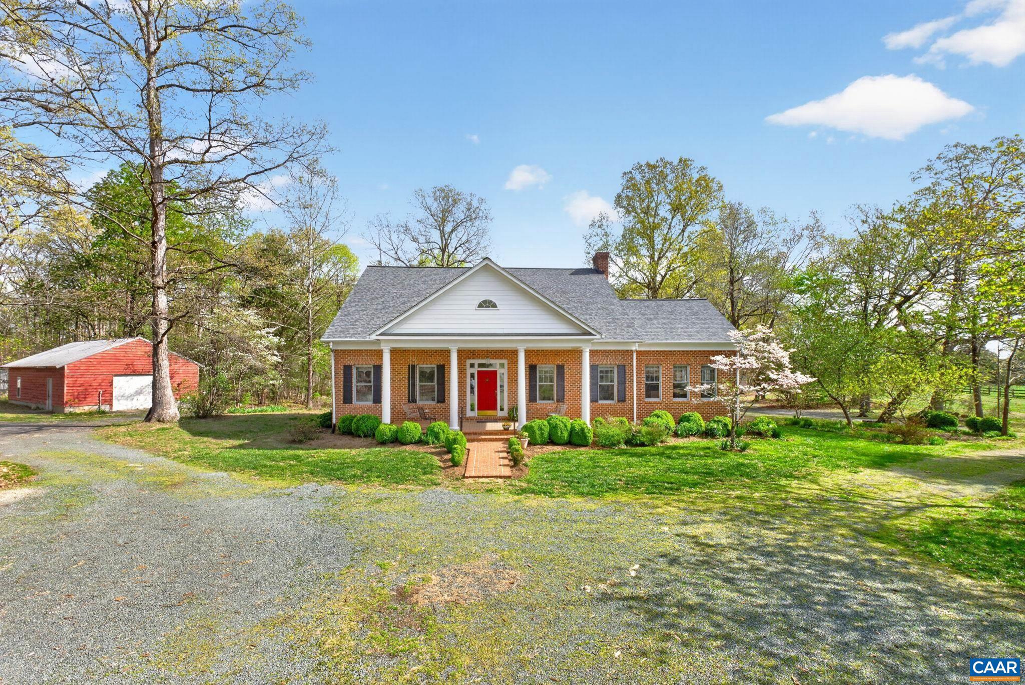 Your Country Lifestyle Awaits! Step into this Elegant Custom Built Retreat by Cecil Cobb. The original owners had thought of every detail when designing this home. Enter into your Grand Foyer w/soaring ceilings to the 2nd level. The 1st level offers over 2300+ fin. sq. ft, w/a Primary bedroom & attached bath, walk in closets. Family Rm w/fireplace & Sun Rm await you w/Gleaming hardwood floors throughout. The large eat in kitchen w/natural light boasts a center island w/gas cook top, pantry, custom cabinets & lots of counter space. 1st level laundry/mud rm off the 2 car garage + guest 1/2 bath. The 2nd level has a primary bedroom w/attached bath, 2 additional bedrooms, full bath & a huge walk in attic area. There is also a bonus room w/closet w/a separate staircase. If you are looking for an in law apartment or AIR BNB this is the home for you.  Lower level has private entrance, full kitchen, bath, laundry & family rm.  Nature is at your doorstep as well. The over 12+ acre outdoor oasis offers a picnic pavilion, run in shed, 2 decks, workshop w/electric & Pasture with fencing. Bring your horses!  You're just minutes from  shopping, medical offices, Pleasant Grove.  Newer Roof, Newer HVAC systems. Multiple flowering gardens & trees.,Glass Front Cabinets,White Cabinets,Wood Counter,Fireplace in Family Room
