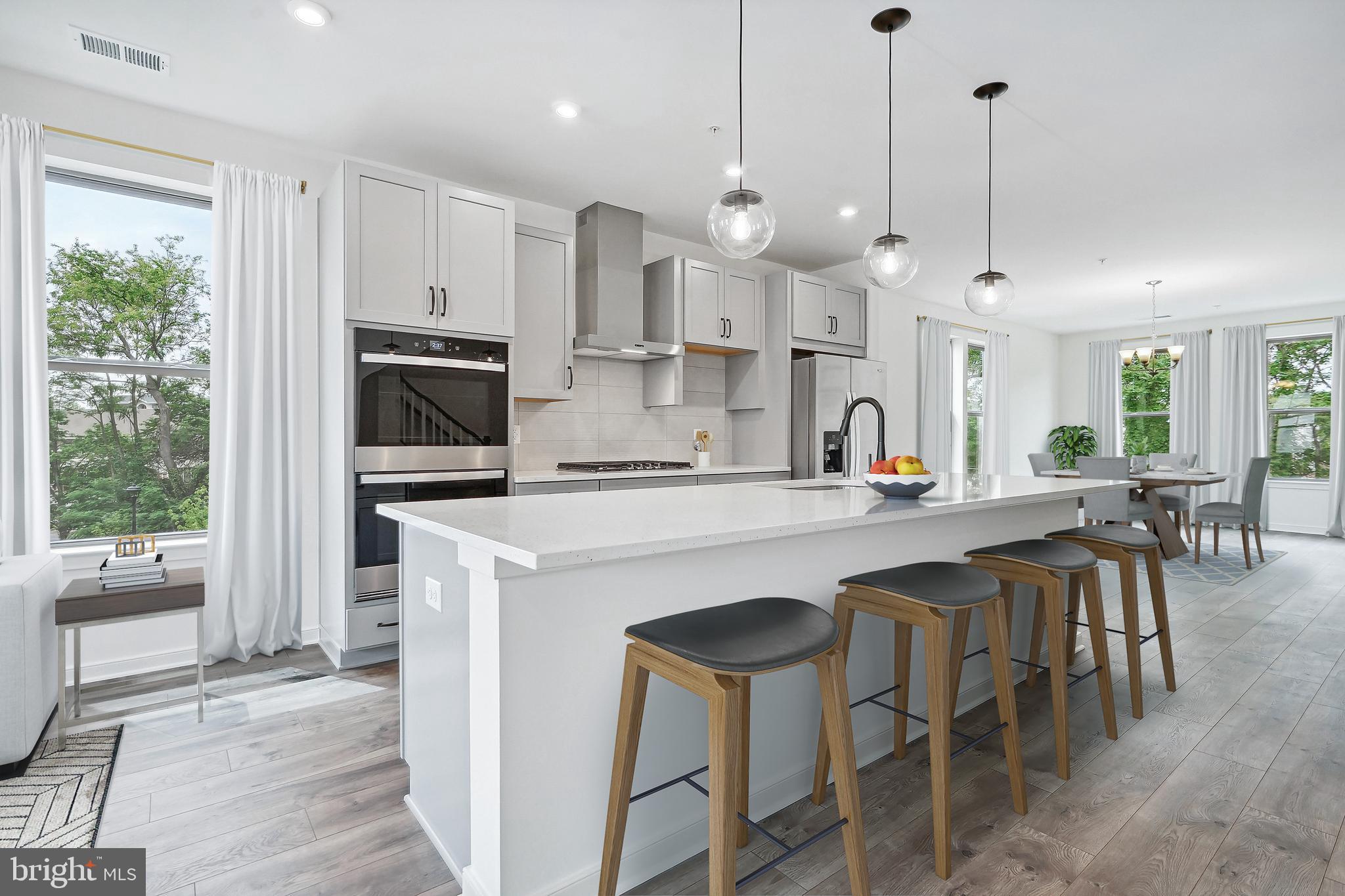 NEW CONSTRUCTION. Special All-In Price, for August Delivery! Special all in price, ready for August move in! Until 6/17, take advantage of a 3.99% 5/1 ARM FHA rate (5.94% APR) with a Choice Lender*. With this 5/1 Adjustable Rate Mortgage, you can lock in a lower, predictable payment for the first five years. See New Home Counselor for Details. Welcome to the Katharine, a brand-new, upscale stacked townhome in the sought-after Belmont Park community in Ashburn, VA. This 2-level home with a 1-car garage is designed for convenience and style, perfect for those ready to move quickly! Featuring 4 bedrooms and 3 baths, this home boasts a modern kitchen with 42” cabinets, LED lighting, quartz countertops, and stainless-steel Whirlpool appliances. This luxury home stands out with a rare main level 4th bedroom, offering the perfect solution for guests or a private home office. A generous kitchen island and open concept main level is designed to live large, with expansive rooms that flow effortlessly for everyday comfort and easy entertaining. The spacious primary suite includes a generous walk-in closet and a luxury bathroom with raised double vanities and a walk-in spa shower. Plus, the garage comes equipped with an EV charger-compatible outlet for future-ready living. Enjoy low-maintenance living with snow removal, lawn care, and exterior upkeep all handled for you—giving you more time to enjoy life, not maintain it. Hometown heroes get $2,500 (restrictions apply; see New Home Counselor for details). Belmont Park offers resort-style amenities including bocce ball, volleyball, playgrounds, community greenspace, and more. Located in Ashburn, you’ll have quick access to major roadways, Dulles Airport, and endless dining and entertainment. Beazer Homes at Belmont Park are designed to live better day to day, with energy‑efficient construction that lowers monthly utility costs, thoughtful design options that make personalization simple, and Mortgage Choice, where our top lenders help you compare options and save money on your home loan. This high‑performance home is built to lower your total cost of homeownership through reduced utility bills, durable materials, and high‑quality construction that minimizes long‑term maintenance costs. Beazer Homes is proud to be America’s #1 Energy Efficient homebuilder. Our FY25 average gross HERS score of 32 (38 excluding solar) was the lowest of the publicly reported scores among the top 30 U.S. homebuilders by volume identified by Builder Magazine’s Top 100 List (based on 2025 total closings). Get protection against rising energy costs without changing how you live. Every Beazer home is pre-wired for solar, making it easier and more affordable to add a renewable system when you are ready. Photos of similar home. Model Home Hours: Mon–Sun, 11 AM–6 PM. Use 19758 Misty Moss Square Ashburn, VA 20147 for GPS directions. Parking will be next to our Information Center trailer. Please go to the model home listed here first.