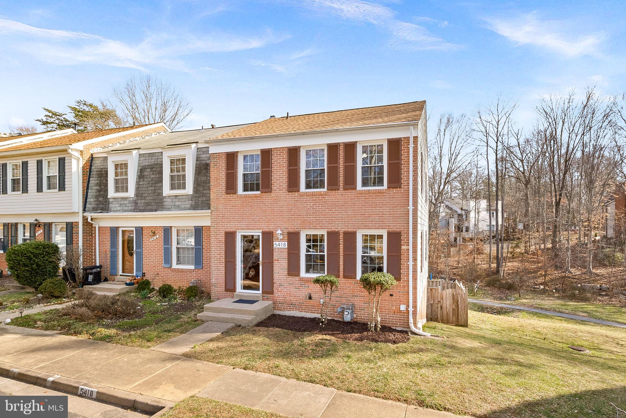 Welcome to this beautifully updated brick end-unit townhouse in the heart of Burke!  This 3-bedroom, 2.5-bath home offers a modern, updated open kitchen with stainless steel appliances and stylish finishes, as well as renovated bathrooms.  The spacious walkout lower level features a large rec room and a second full bath—perfect for guests or additional living space.  Enjoy serene views of open green space and the lake from your private deck.  Beautiful hardwoods on main and lower level, & roof is 4 years young.   Walking distance to top-rated school and close to parks, trails, shopping, and commuter routes.  House backs to open area with path to lake, no houses directly behind make it very comfortable.  Pets allowed, but this house has not had any pets for the last 20 years.  Multiple pools, tennis courts, & pickleball courts too.    Don’t miss this incredible opportunity!