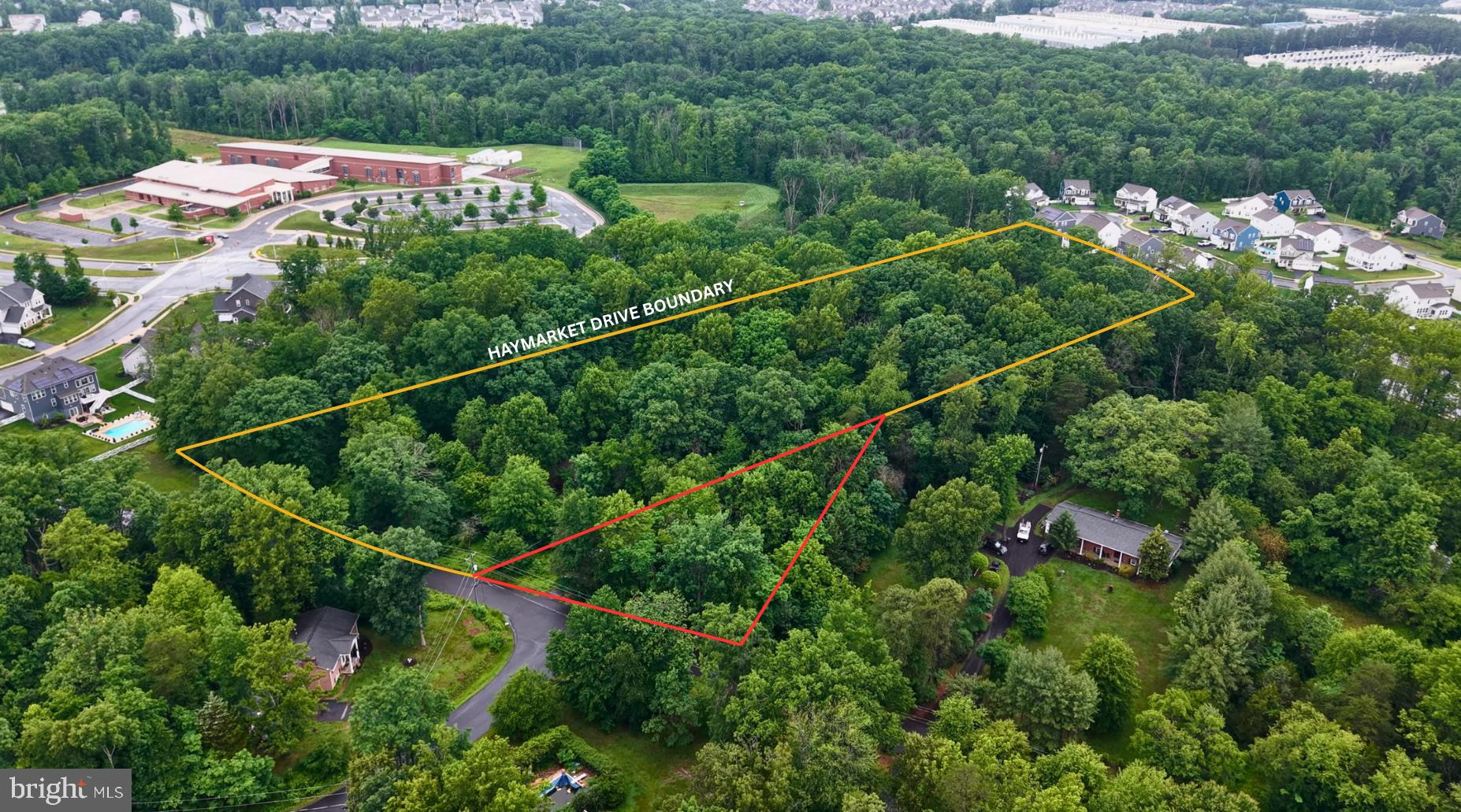 Opportunities like this do not come around often. Nestled in the highly sought-after town of Haymarket, this FIVE ACRE buildable lot, with NO HOA, offers the perfect setting for your dream home, family compound, or future potential development.  Located just one mile from downtown Haymarket with quick access to I-66 and Route 15, you get the rare combination of space, convenience, and location. Public water and sewer access are just down the road, adding even more potential to this incredible property.  Listing includes two lots being sold together (4.68 and .60 acres for a total of 5.28 acres).