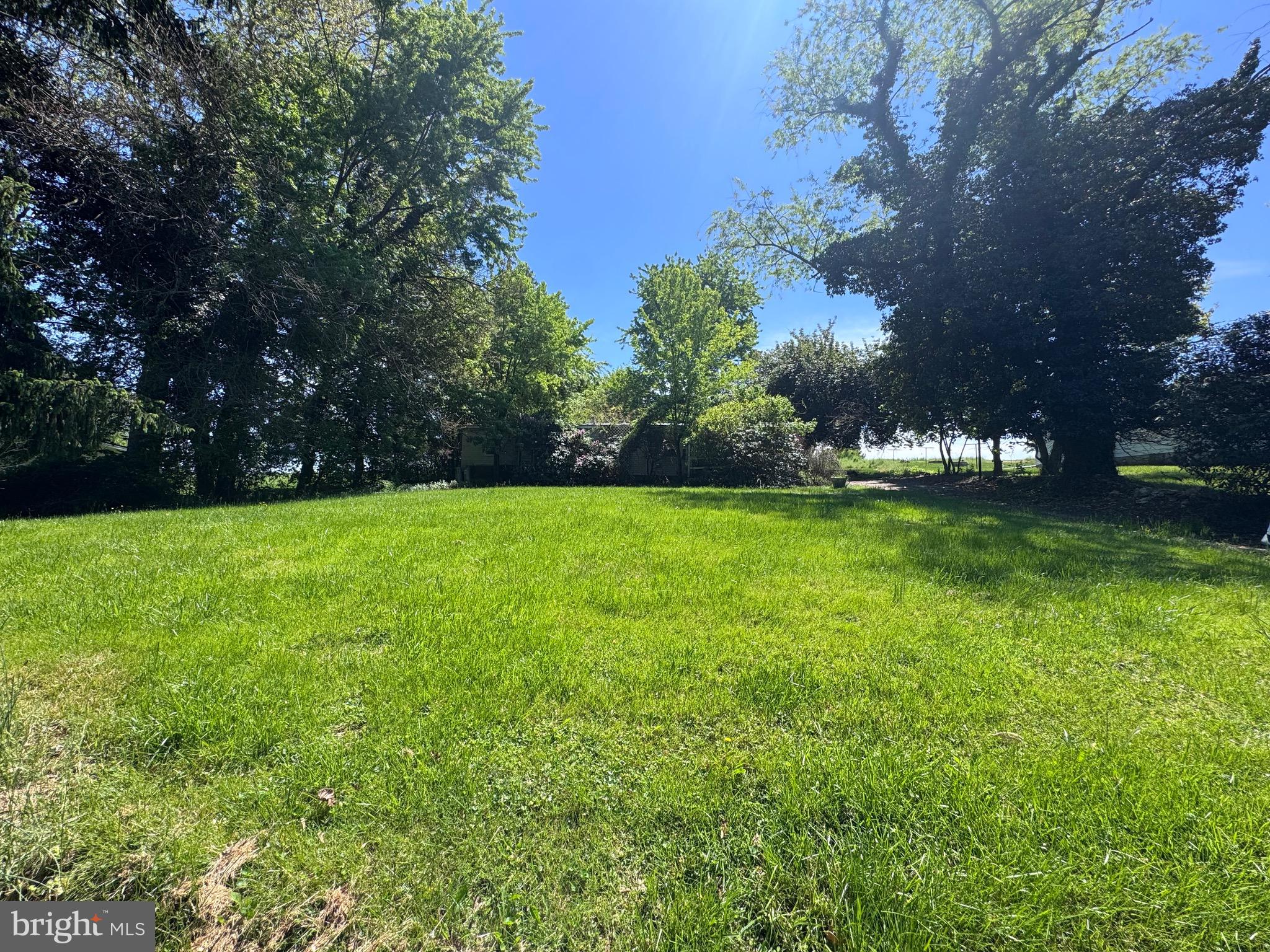 Rare opportunity in  Bel Air! This .55-acre lot offers a prime setting backing to open farmland with peaceful views and a sense of privacy that’s hard to find. The property is mostly cleared and already equipped with an existing well and septic, providing a valuable head start for your future plans.
An existing mobile home is currently on site and will need to be removed—true value is in the land. Whether you’re looking to build your dream home or invest in a desirable location with strong potential, this property checks the boxes.
Enjoy a country feel while remaining just minutes from shopping, dining, and commuter routes. Endless possibilities—bring your vision!