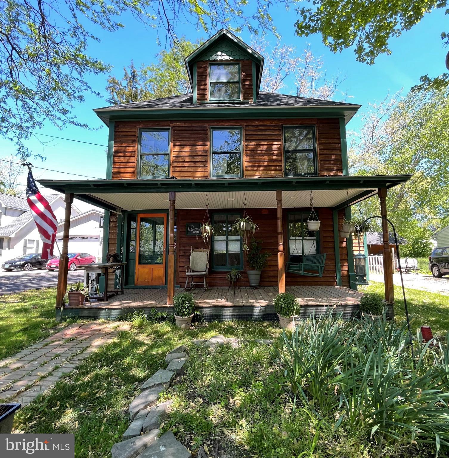 Well maintained charming farmhouse  on 1/3 acre with 2 bedrooms, 1.5 baths , updated kitchen, living room, 3rd floor bonus room(office/playroom), laundry room, screened-in back porch, front porch, fenced in backyard and 2 storage sheds.  Newer roof, windows and septic.  Just minutes to shopping, restaurants , marinas, and Bay Bridge.  Interior photos coming soon