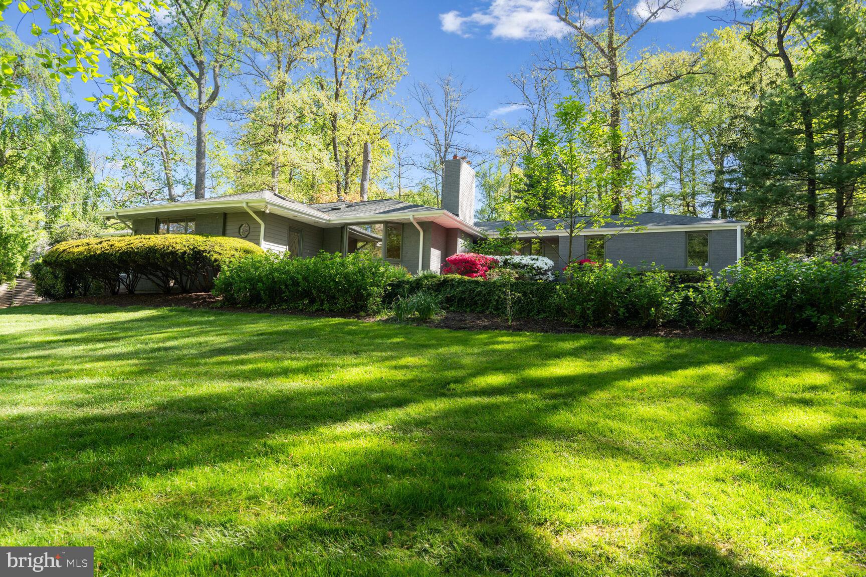 Fantastic Mclean home with a large .97 acre lot with a pool. This open floor plan has over 5,000 square feet (est.) of finished space. The main floor  has a welcoming foyer, spacious living room with fireplace, eat-in kitchen and family room, The main level primary suite has a large walk-in closet and soaking tub. Two more bedrooms with baths complete the main floor. The finished lower level has a kitchen and a bedroom and full bathroom with the potential for an in-law or au-pair suite. Mature landscaping enhances the pool and grounds. The large two car garage opens to more driveway parking and a long driveway.