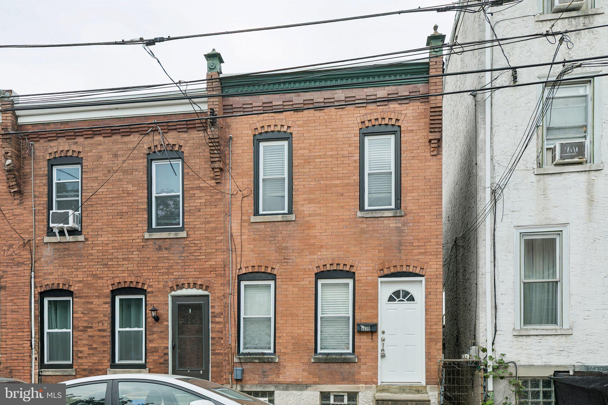 A great opportunity awaits for this roomy 2-bedroom end-of-row in the continued up-and-coming Manayunk section of Philadelphia, easily accessible to downtown, transportation, sporting arenas, and more.
Front living room, middle dining room, and rear galley kitchen with exit door to a fenced back yard. Full basement with cemented and painted walls, the heater, laundry facilities, and additional storage. Second level, two bedrooms and an upgraded bath with tub/shower and vanity sink. Priced well in today's market. Easy to inspect. Call today!