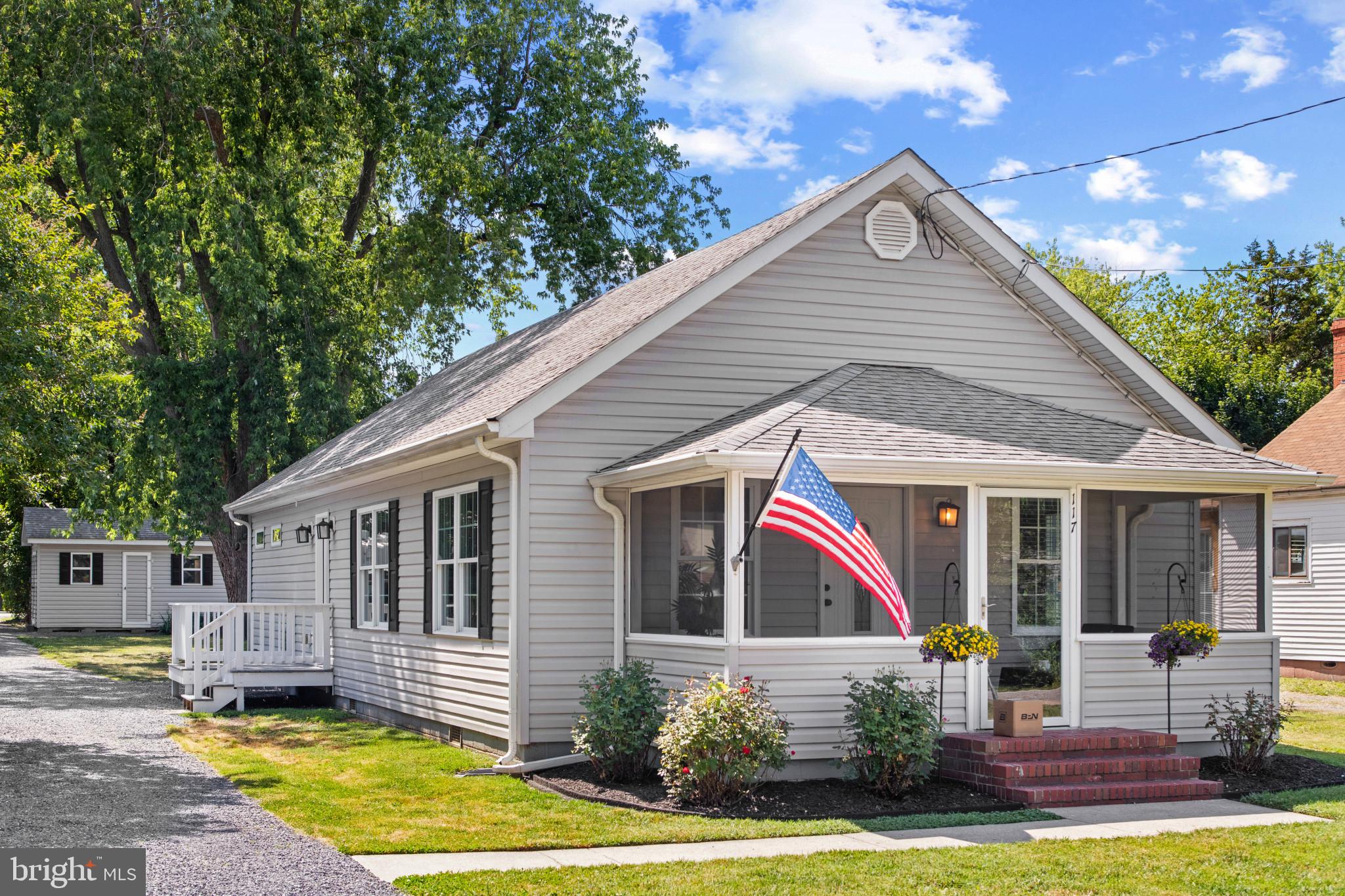 Welcome to 117 Dundee Ave! This beautifully maintained 3-bedroom, 2-bath rancher is truly move-in ready and waiting for you to start your next chapter. Nestled on a spacious 0.28-acre lot along a quiet street, the property offers added convenience with a long gravel driveway accessible from both Dundee Ave and Shamrock Road. Step inside to discover a meticulously cared-for interior featuring an inviting open-concept layout, perfect for both everyday living and entertaining. You'll love the sense of space and comfort throughout. Enjoy the unbeatable location—within walking distance to local dining and retail, and just a short drive to numerous waterfront restaurants. Commuters will appreciate the easy access to Route 50 and the Bay Bridge. Don’t miss this rare opportunity to enjoy the perfect blend of peaceful living and everyday convenience!