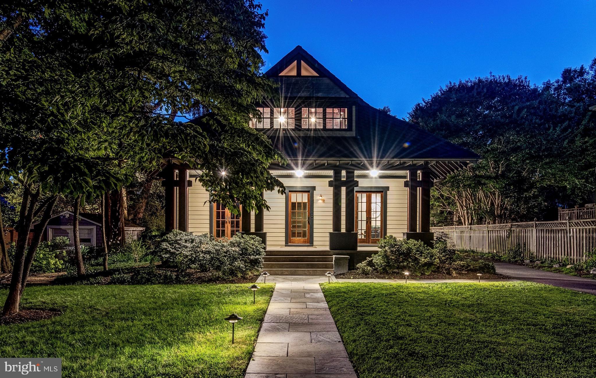 This exceptional property beautifully blends 1920’s character and charm with modern luxury! Located just over a mile to the restaurants, shops, Metro and all downtown Bethesda has to offer, as well as walking/biking distance to Pyle Middle School and Walt Whitman High School. A garden oasis, tucked away in a tranquil setting with circular driveway and mature landscaping providing privacy from the street and surrounding neighbors!  The Bungalow style home has been gorgeously expanded and renovated, featuring 6 bedrooms & 4.5 bathrooms.  The show stopper of the home is a stunning state-of-the-art award winning gourmet kitchen, featured on HGTV, opening to an expansive family room with floor-to-ceiling windows, elevated ceilings, exposed wooded beams, a stand alone wood-burning stove, and reclaimed oak flooring throughout. Details of the chef’s kitchen include Macassar ebony cabinets, honed granite countertops, Gaggenau cooktop with built-in grill and deep fryer, specialty lighting and glass accent wall. A custom-built table extends the island or can be a stand alone dining table. The impressive kitchen extends to a butler’s pantry area with additional cabinetry, built-in coffee machine, sink, separate ice maker, an additional dishwasher and a tucked-away wet bar behind beautiful shoji screens. The large family room overlooks the serene green outdoor space with flagstone patio and opens to a screened-in porch. The flow is perfect for entertaining indoors or out! 

Other features of the main level include a light-filled living room, central dining room, bedroom suite with full bathroom, an ideal office or additional bedroom and a powder room. Museum rails run along the main level providing a beautiful option for hanging art. A built-in surround sound system is also located throughout the home.

The upper level hosts the expansive primary suite with elevated cathedral ceilings with exposed wooden beams and skylights, sitting area, and dressing room with walk-in closet. The remarkable primary bathroom is Japanese inspired with a rain shower, Verde Bamboo granite wall, embedded river stones, and lovely soaking tub. Three additional bedrooms, two beautifully updated bathrooms and two sets of washer and dryers are also on this level. One of the rooms features a kitchenette and separate entrance, making it a great guest or in-law suite or additional living area. 

The property has a long driveway providing an abundance of off-street parking as well as a one-car garage with electric vehicle charging outlet and attic storage. Additionally there is an invisible fence around the property for those with dogs.  

Don't miss this special property in an unbeatable location!