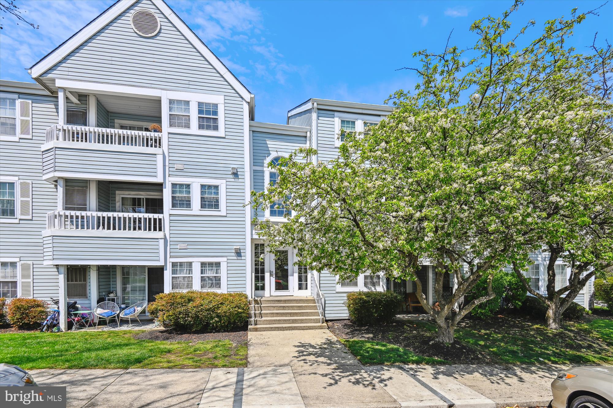 The Villages of Montgomery Run....well-loved and maintained beautifully updated top floor condo awaits your inspection. TONS of NATURAL LIGHT FLOWS - This two-bedroom, two-baths has vaulted ceilings.   The kitchen is complete with stainless steel appliances, granite countertops, and tasteful white raised panel cabinets. The washing machine and dryer are tucked away in the kitchen. Ceramic tile flooring enters from the foyer and flows through the galley kitchen.  A living room anchored with a wood burning fireplace, and built-in cabinetry and hardwood floors. The owner's bedroom is large, has a great size walk-in closet and offers a dressing area and updated bathroom. The 2nd bedroom is of generous size and joins a center hall bathroom. The community offers fantastic amenities, including an outdoor pool, tot lot, and one reserved parking space for added convenience. The condo fee covers the water for the unit. There are ample visitor parking spaces, and an ideal Ellicott City location. Minutes to major commuter routes, shopping, and restaurants.