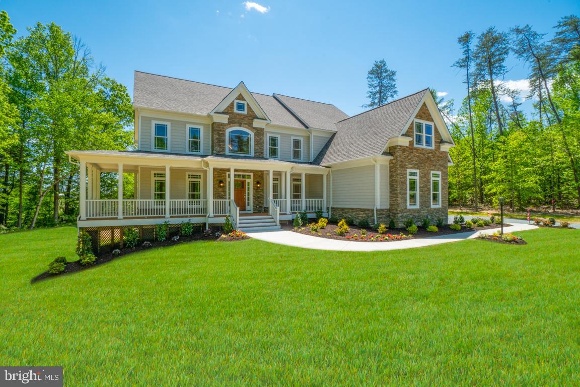 TO BE BUILT
Nestled in the vibrant and sought-after community in Fredericksburg, Virginia, an exceptional opportunity awaits you—a custom-designed luxury home that has yet to be built. This prime location offers a lifestyle of convenience and ease, with effortless access to major transportation routes like I-95 and Route 1, proximity to shopping destinations, and the convenience of a nearby hospital.

This future masterpiece will be a sprawling 4-bedroom, 3-full bath residence that embodies the epitome of modern luxury and elegance. With a focus on spacious living and lavish amenities, this home is designed to cater to your every desire.

The crown jewel of this future home is the incredible primary bedroom suite, an oasis of comfort and opulence. Step into the luxurious primary bath, featuring an oversized shower and a separate freestanding soaking tub, where you can unwind and rejuvenate after a long day. The pièce de résistance is an enormous custom closet that's sure to satisfy the most discerning fashion aficionado.

The main level of this extraordinary home is designed for both entertainment and functionality. The heart of the home is a large gourmet kitchen, complete with double wall ovens, a large cooktop, a side-by-side refrigerator, and a spacious island that serves as a culinary hub and gathering place. Adjacent to the kitchen, a large sunroom bathes the space in natural light, creating an inviting atmosphere for meals and relaxation.

The 2-story family room exudes grandeur and warmth, centered around a focal point fireplace that adds character and charm. Formal occasions will be celebrated in the elegant dining room and formal living room, both designed to impress guests with their timeless design and grace.

For those who require a dedicated workspace or study, a separate study on the main level provides the privacy and tranquility needed for productivity.

Storage is never an issue with a walk-in pantry that ensures your kitchen remains organized and clutter-free. Additionally, a main-level laundry room and a spacious half bath offer added convenience and functionality.

With a 2-car side-load garage, your vehicles are not only protected but easily accessible, making daily routines a breeze.

The lower level of this future home is a canvas awaiting your creative touch, with an expansive unfinished basement featuring double French doors for a walkout and two full-sized windows. This space has the potential to be transformed into a recreational haven, additional living areas, or an impressive home theater—the possibilities are endless.

This to-be-built luxury home is your opportunity to create the perfect living space, customized to your unique tastes and lifestyle. With a prime location, impeccable design, and the promise of luxury, this is your chance to make a dream home a reality in the heart of Fredericksburg, VA. Welcome to a future filled with comfort, elegance, and convenience.