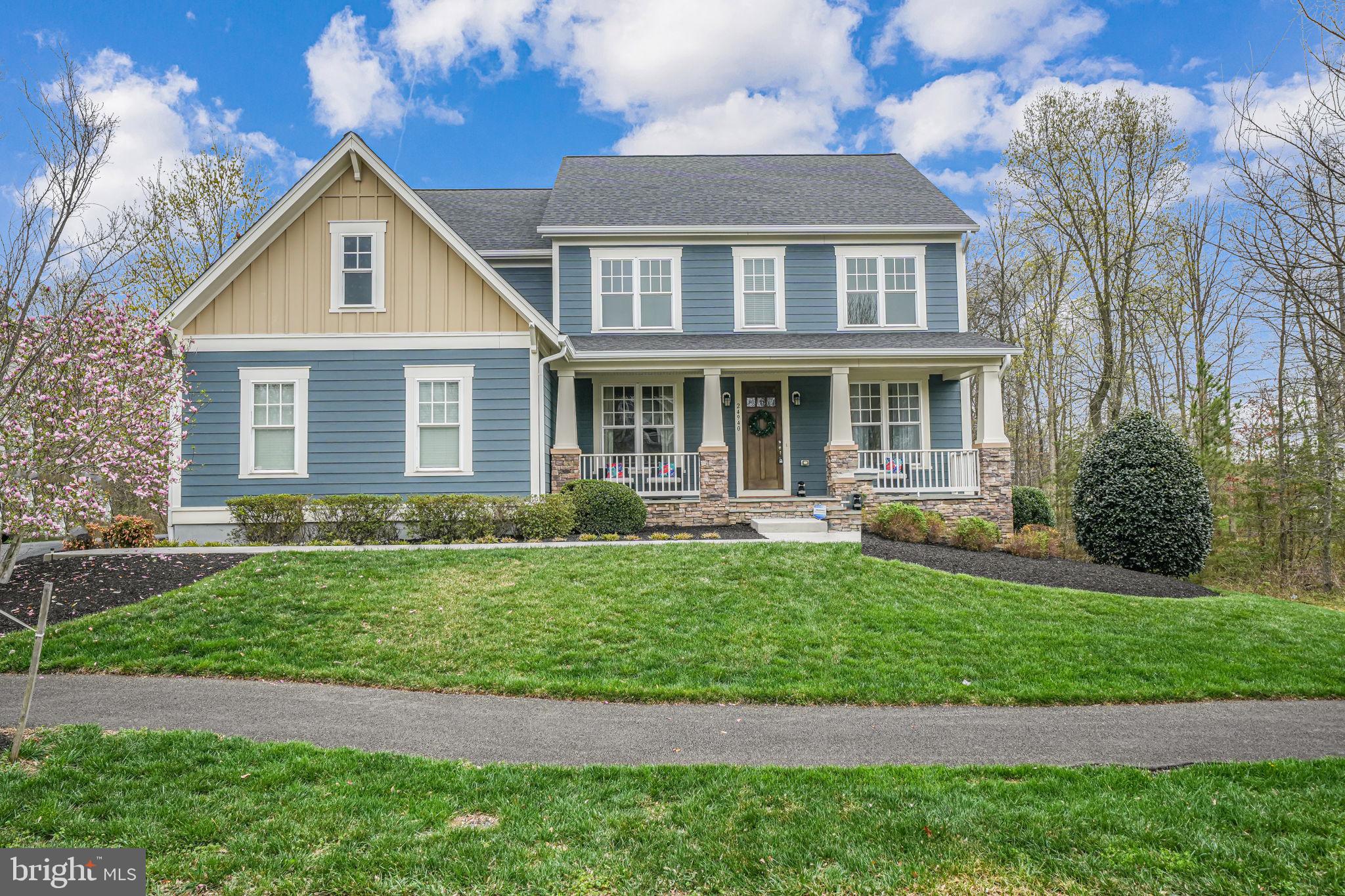 Step into timeless elegance with this exceptional Ashford Beazer model, perfectly nestled in the award-winning Willowsford community, framed by the natural splendor of Loudoun’s wine country. Designed for luxurious living and modern family life, this home is a rare gem that effortlessly blends architectural sophistication with inviting, livable spaces.

At the heart of the home is a stunning two-story family room, soaring with light and volume, featuring a dramatic gallery overlook from the upper level and walls of windows that flood the space with natural light. The thoughtfully designed main level includes a formal sitting room, an elegant dining room, a dedicated home office, a chef-inspired kitchen with an adjoining breakfast area and a sunroom — perfect for casual family moments or entertaining in style.

Recent upgrades elevate the home’s exterior, including new Hardie Plank siding, a new roof, and a new gutter guard system for worry-free maintenance and long-term durability. Outdoor living is just as spectacular, with a beautiful stone patio in the back of the house, a spacious deck for relaxing or hosting gatherings, and a convenient sprinkler system to keep the landscaping lush and green.

Upstairs, four spacious bedrooms and three full bathrooms provide a comfortable retreat for the whole family. Natural light continues to pour in through oversized windows throughout the home, enhancing the warmth and openness of every room.

The expansive, unfinished basement is a blank canvas waiting for your personal touch — ideal for a home theater, gym, guest suite, or playroom. The possibilities are endless.

Beyond the home itself, enjoy all that Willowsford has to offer — resort-style amenities including outdoor beach-entry pools, a splash pad, The Lodge, fitness center, dog parks, lakes, tot lots, a sledding hill, and even a whimsical treehouse. Nature lovers will appreciate the walking trails and the neighborhood farm stand and CSA.

Located just minutes from Brambleton Town Center, One Loudoun, and Hal and Berni Hanson Regional Park (257 acres!), you’re never far from shopping, dining, and entertainment. Convenient access to Dulles Airport, Wegmans, local farmer’s markets, and Loudoun’s renowned wineries and breweries. Commuters will appreciate easy routes to Dulles, Tysons, Washington, DC, and the Silver Line METRO — all within reach.

Served by highly sought-after Loudoun County public schools, this home truly offers the pinnacle of comfort, community, and lifestyle.