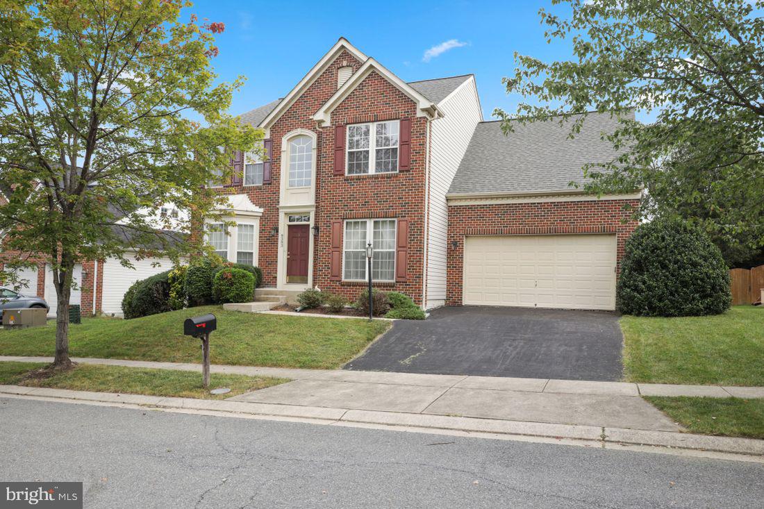 Space Galore in this wonderful Brick front Colonial! With 4 bedrooms and 2 full baths on the upper level. Expansive primary bedroom with large walk-in closet, primary bath with soaking tub, separate shower, and two vanities. Your entry to the home begins with a large inviting foyer and gorgeous hardwood floors throughout. The main level continues and includes an eat-in kitchen that connects to a spacious family room. For more formal occasions, there is a separate and spacious dining room and to complete the main level, there is a separate living room. The lower level offers tons of potential to customize. Please call the listing agent with any questions.