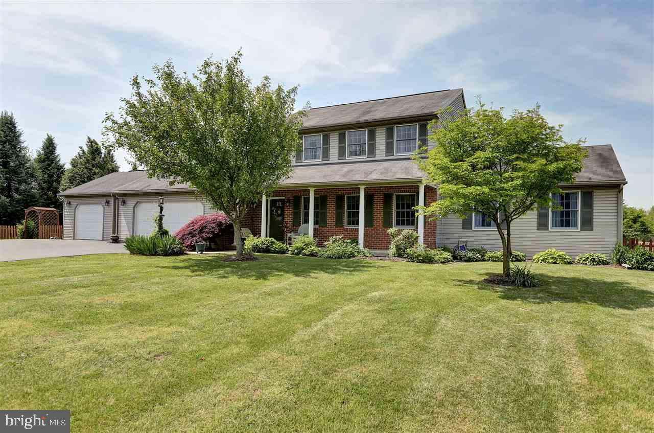 Don?t miss this remarkable 2,616 sqft 2 story home on a beautifully landscaped  2.12 acre lot.  This property features 4 bedrooms including a first floor master suite with a full bath, walk in closet and private deck, 3.5 baths, large living room which is open to a one of a kind kitchen, covered rear deck, covered front porch, 3 car garage, fenced rear yard, storage shed, and paved drive.  This property is a must see!
