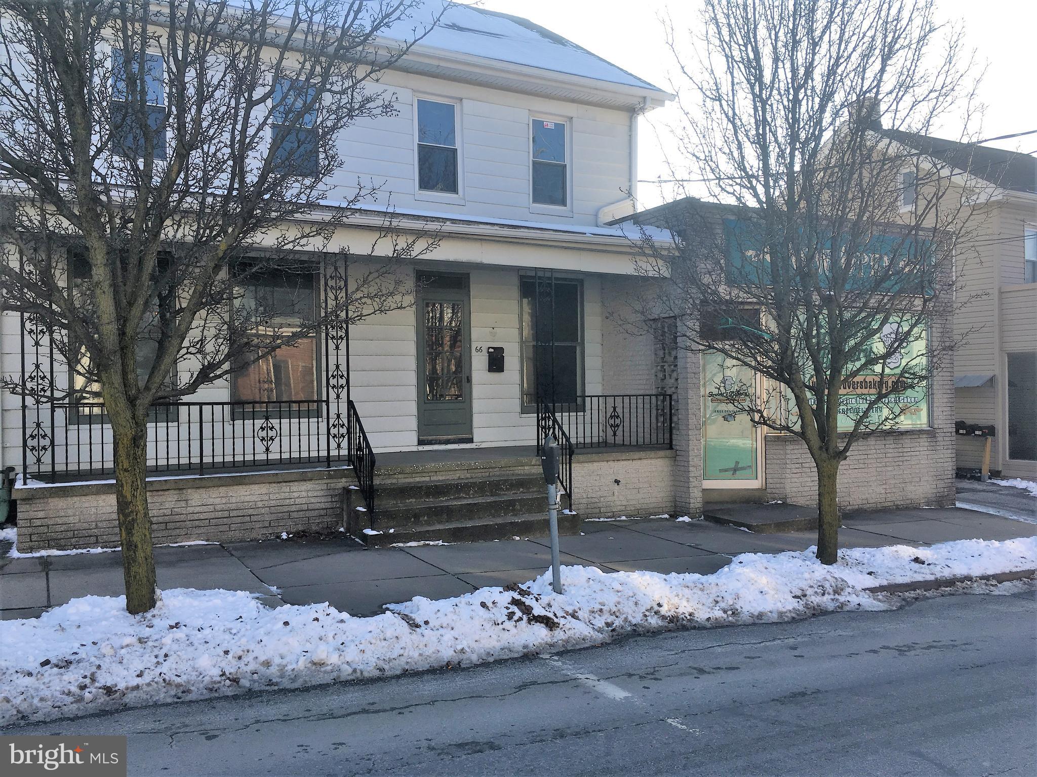 Opportunity is the best way to describe this unique commercial/residential property on Main Street in the heart of Dallastown Boro.  You start with a 4 bedroom house that fronts on Main St.  Attached to that is an almost 2300 sq. ft commercial space with 200 AMP 3 phase electric service, separate walk in freezer and refrigerator along with wall racks and glass counter.  To the rear of these buildings is ample parking plus an additional 2900 plus sq. ft warehouse.  The possibilities are endless.  The zoning is commercial shopping and you can go to Dallastownboro.com for the list of acceptable uses.